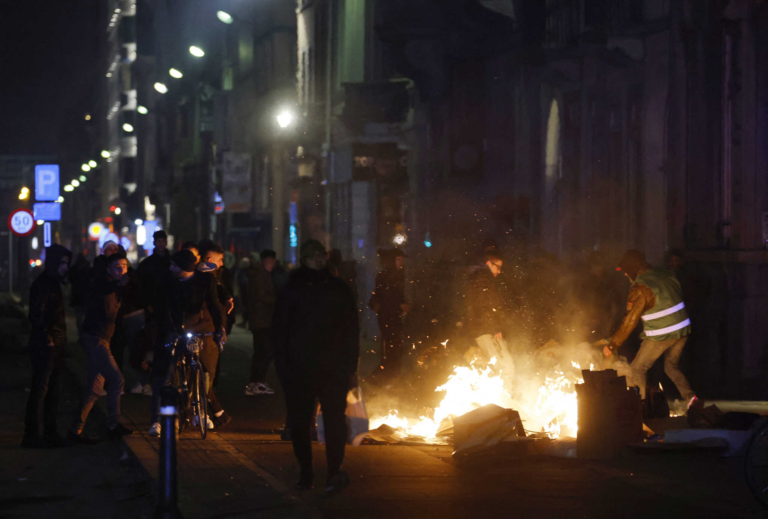 Soccer Football - FIFA World Cup Qatar 2022 - Fans in Brussels watch France v Morocco - Brussels, Belgium - December 14, 2022 General view of a fire after the match REUTERS