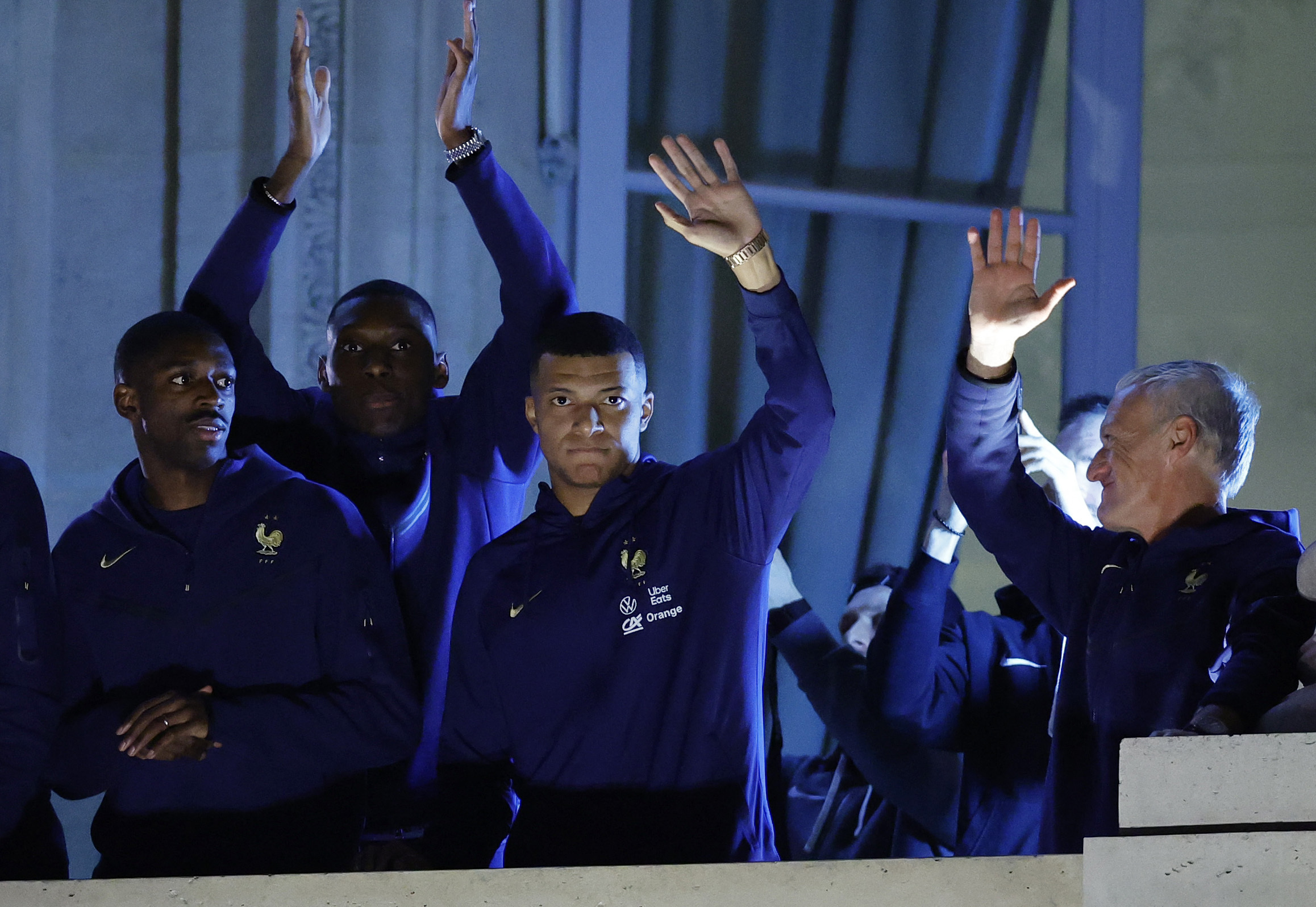 Soccer Football - FIFA World Cup Qatar 2022 - France team at Hotel Crillon after losing in the World Cup Final against Argentina - Paris, France - December 19, 2022 France's Kylian Mbappe and teammates greet the fans from a balcony REUTERS