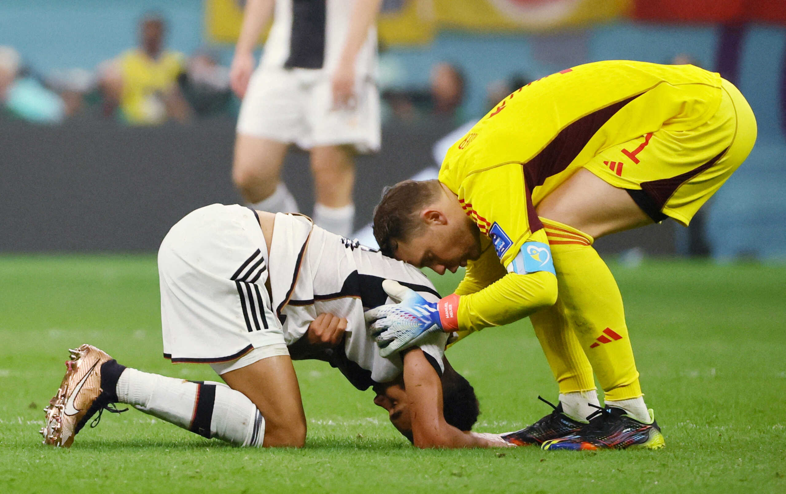 Soccer Football - FIFA World Cup Qatar 2022 - Group E - Costa Rica v Germany - Al Bayt Stadium, Al Khor, Qatar - December 1, 2022 Germany's Manuel Neuer and Jamal Musiala REUTERS