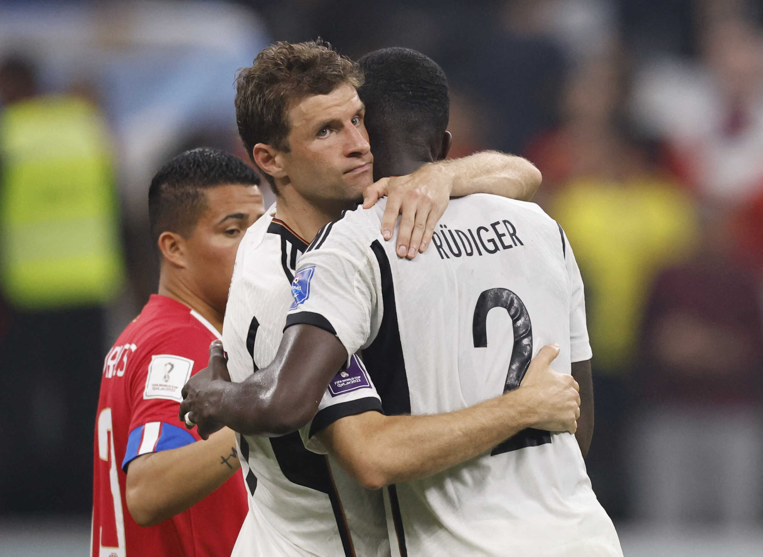 Soccer Football - FIFA World Cup Qatar 2022 - Group E - Costa Rica v Germany - Al Bayt Stadium, Al Khor, Qatar - December 1, 2022 Germany's Thomas Muller and Antonio Rudiger look dejected after the match as Germany are eliminated from the World Cup REUTERS