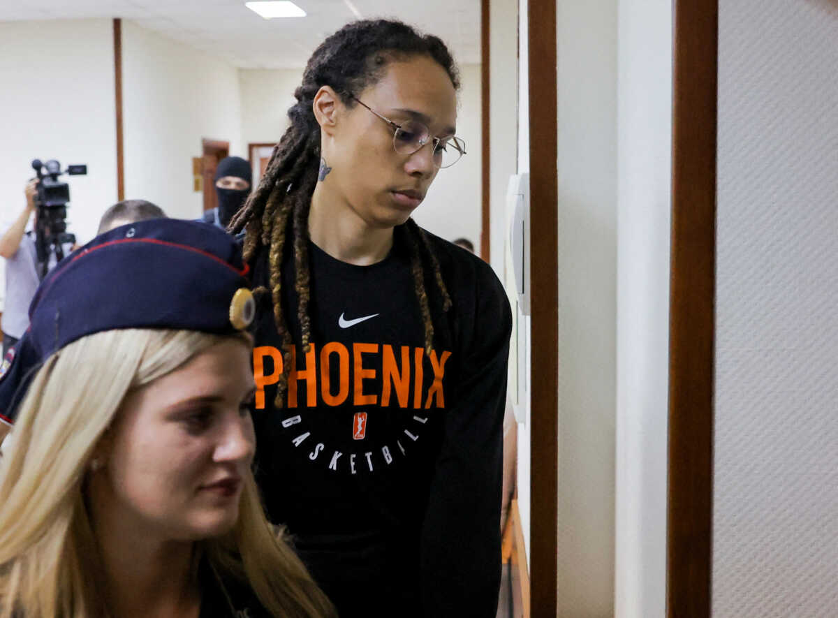 FILE PHOTO: U.S. basketball player Brittney Griner, who was detained at Moscow's Sheremetyevo airport and later charged with illegal possession of cannabis, is escorted before a court hearing in Khimki outside Moscow, Russia July 27, 2022. REUTERS