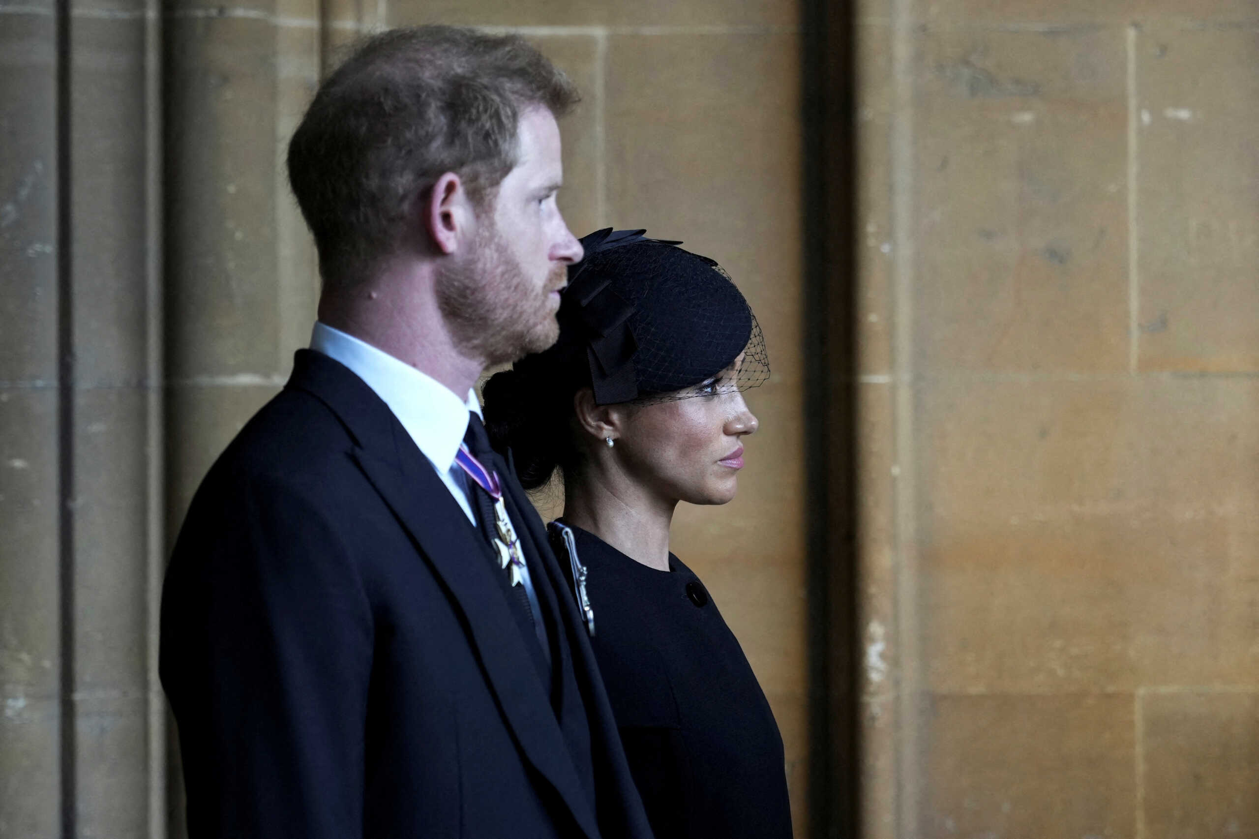 FILE PHOTO: Britain's Prince Harry, left, an Meghan, Duchess of Sussex, leave after they paid their respects to Queen Elizabeth II in Westminster Hall for the Lying-in State, in London, Wednesday, Sept. 14, 2022. Emilio Morenatti