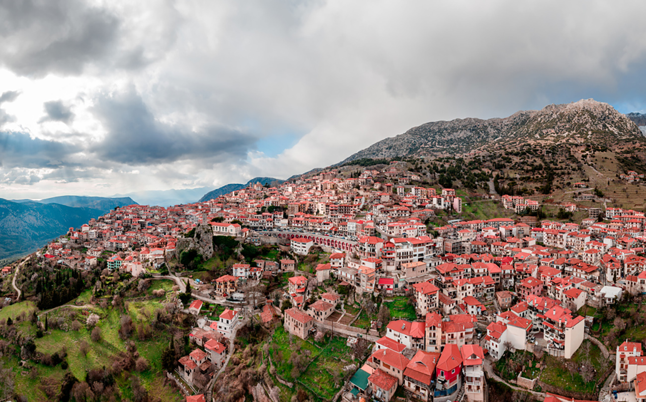Aerial panoramic photo of Arachova and Parnassos at winter before the storm