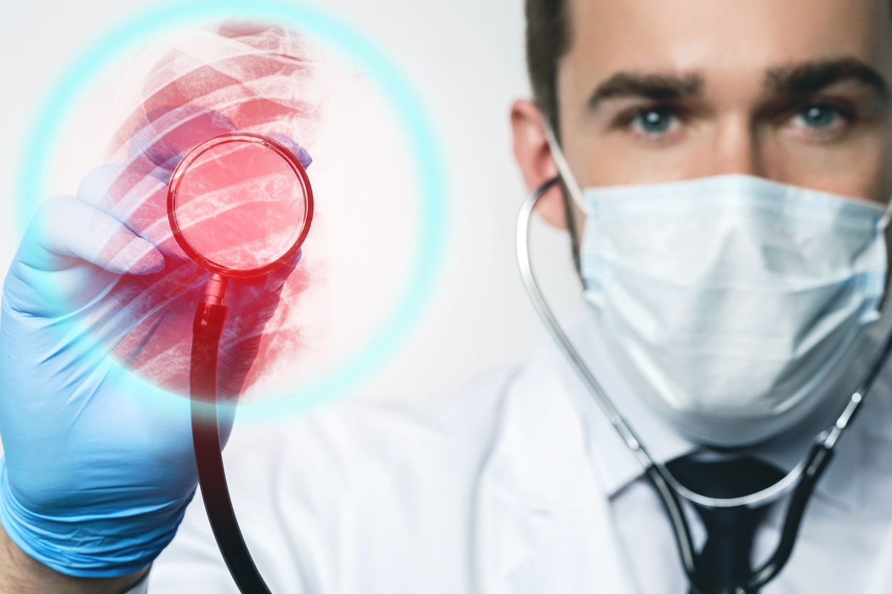 Pulmonologist with stethoscope inspecting lungs for diseases