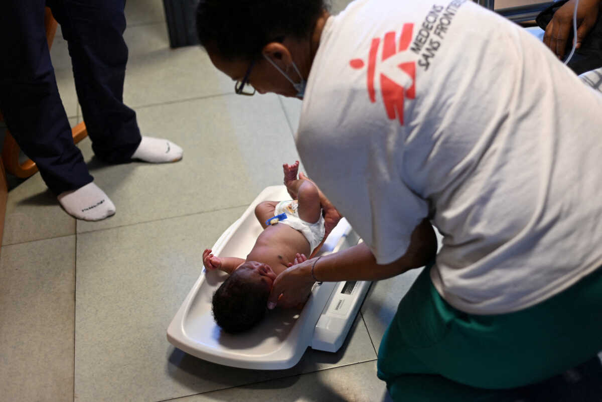 A baby boy named Ali is seen in this picture released by Doctors Without Borders (MSF) on December 7, 2022 a few minutes after his birth on board the migrant rescue ship Geo Barents in the central Mediterranean on December 7, 2022. Candida Lobes