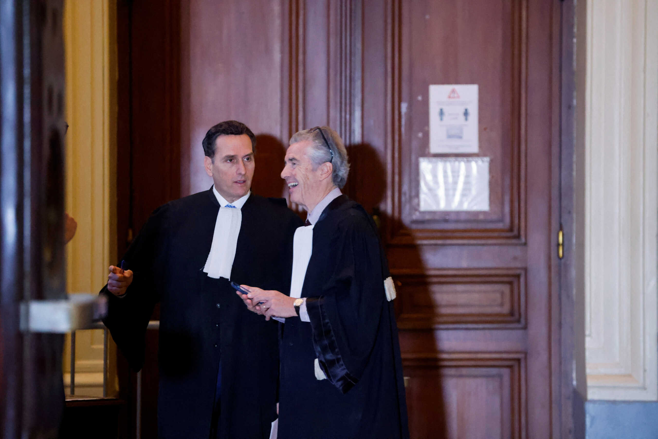 Greek Member of European Parliament Eva Kaili's lawyers Michalis Dimitrakopoulos and Andre Risopoulos speak, on the day Eva Kaili, former vice-president of the European Parliament, appears before magistrates in Brussels, Belgium December 22, 2022. REUTERS