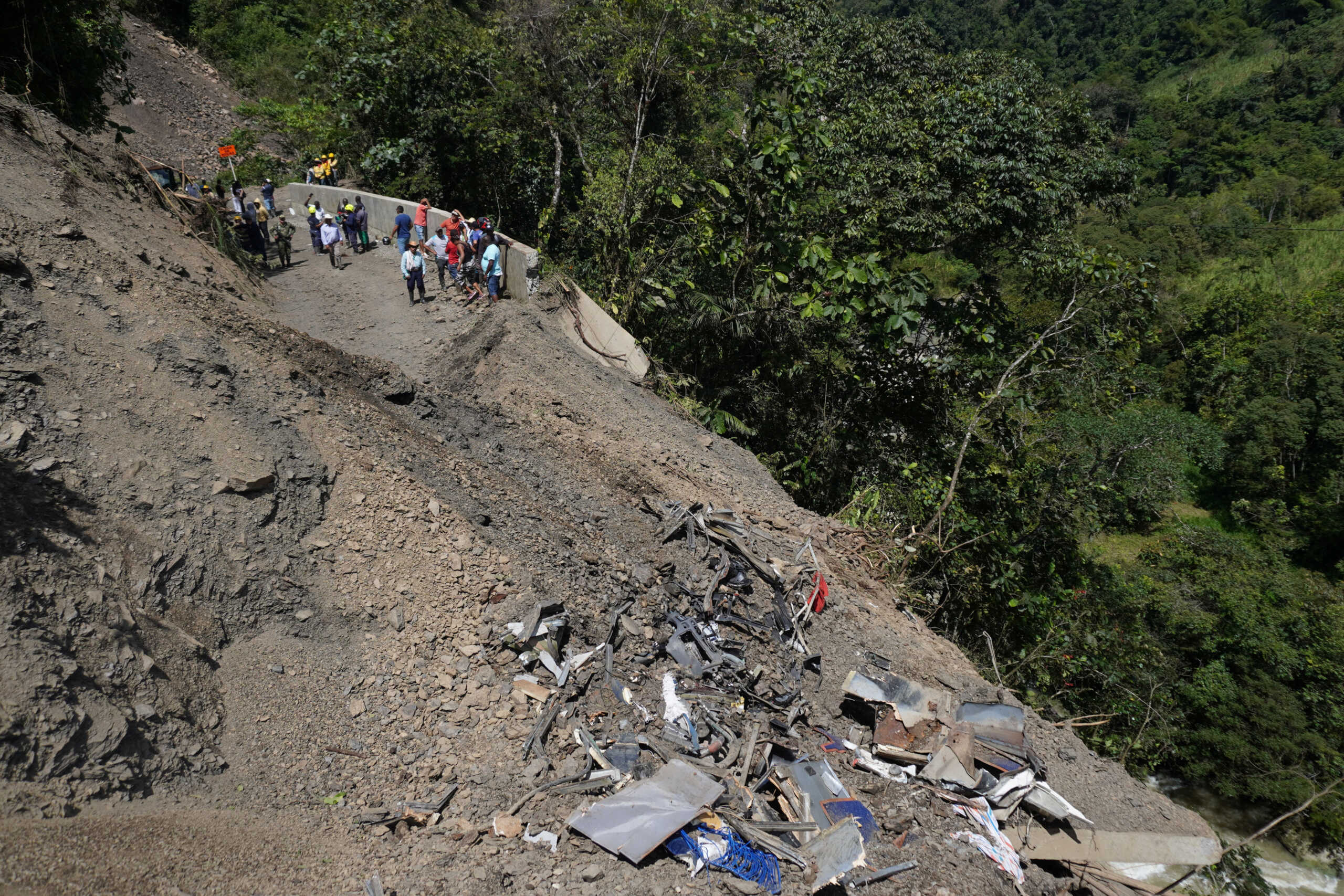 Debris is seen after a bus was buried by a landslide due to heavy rains in Pueblo Rico, Colombia December 5, 2022. REUTERS