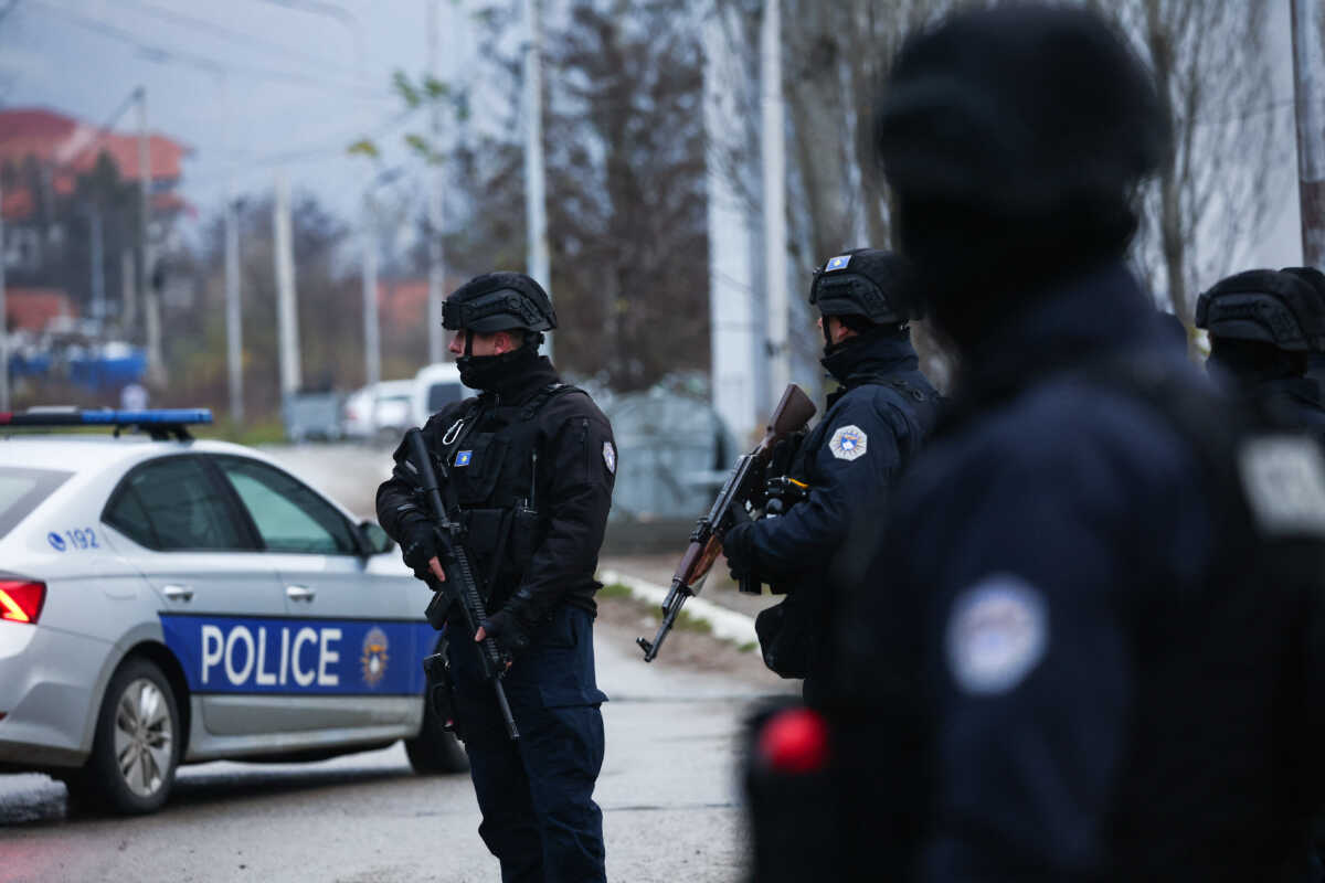 Kosovo police officers patrol an area in the northern part of the ethnically-divided town of Mitrovica, Kosovo, December 13, 2022. REUTERS