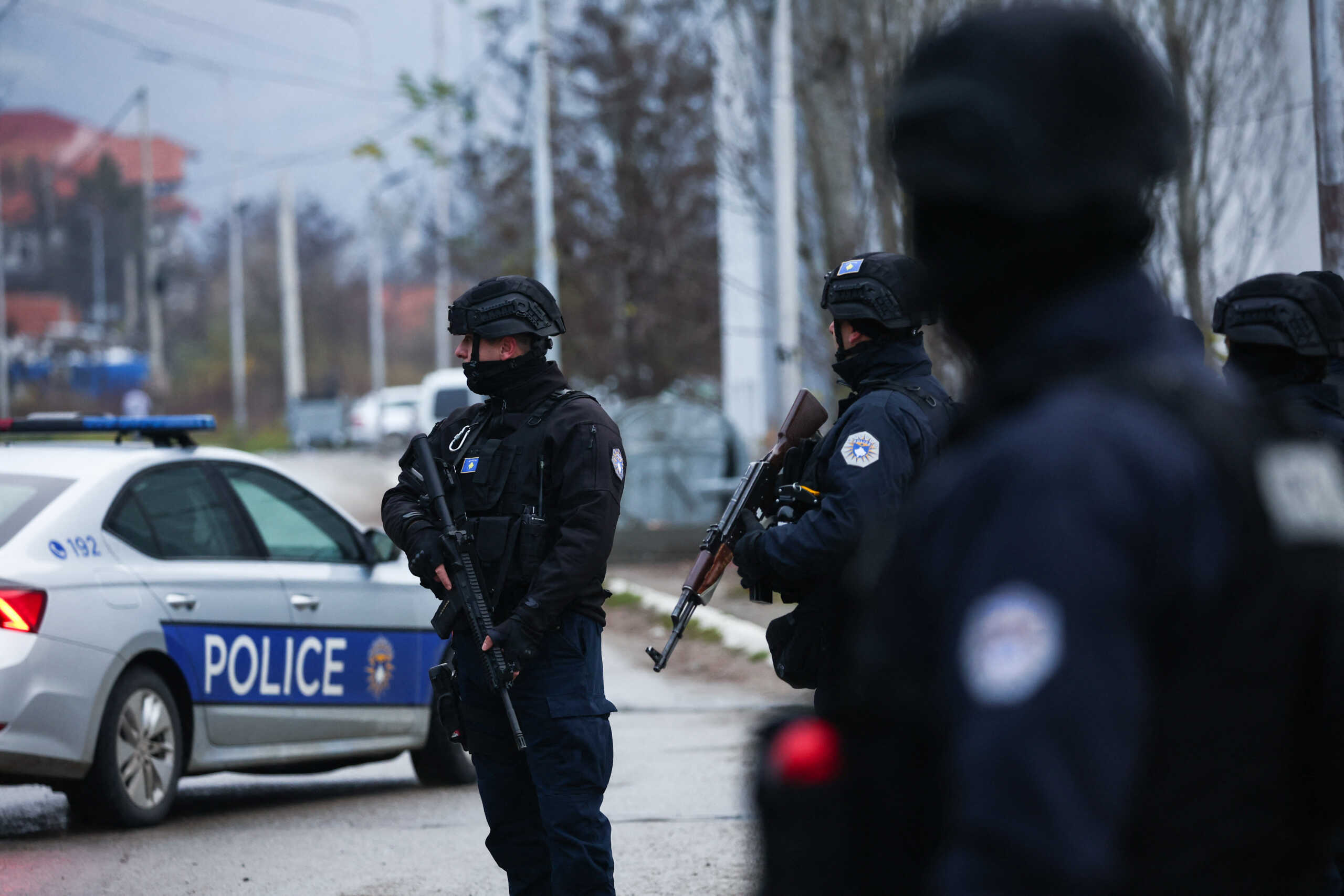 Kosovo police officers patrol an area in the northern part of the ethnically-divided town of Mitrovica, Kosovo, December 13, 2022. REUTERS