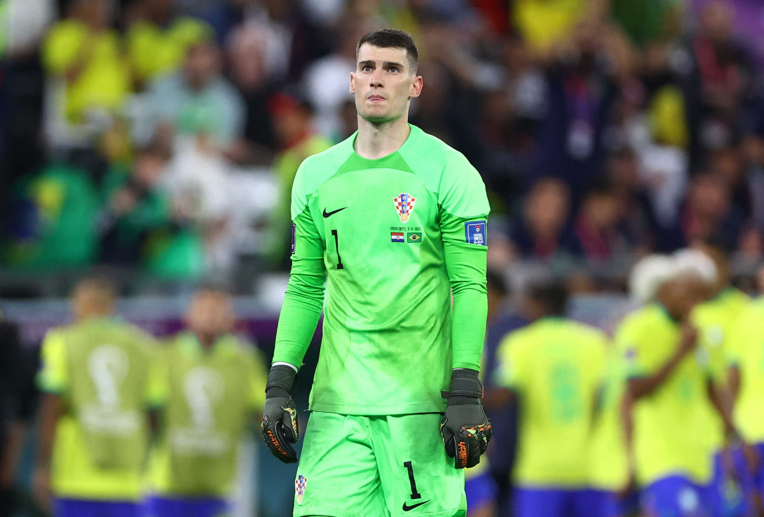 Soccer Football - FIFA World Cup Qatar 2022 - Quarter Final - Croatia v Brazil - Education City Stadium, Doha, Qatar - December 9, 2022 Croatia's Dominik Livakovic looks dejected after Brazil's Neymar scores their first goal REUTERS