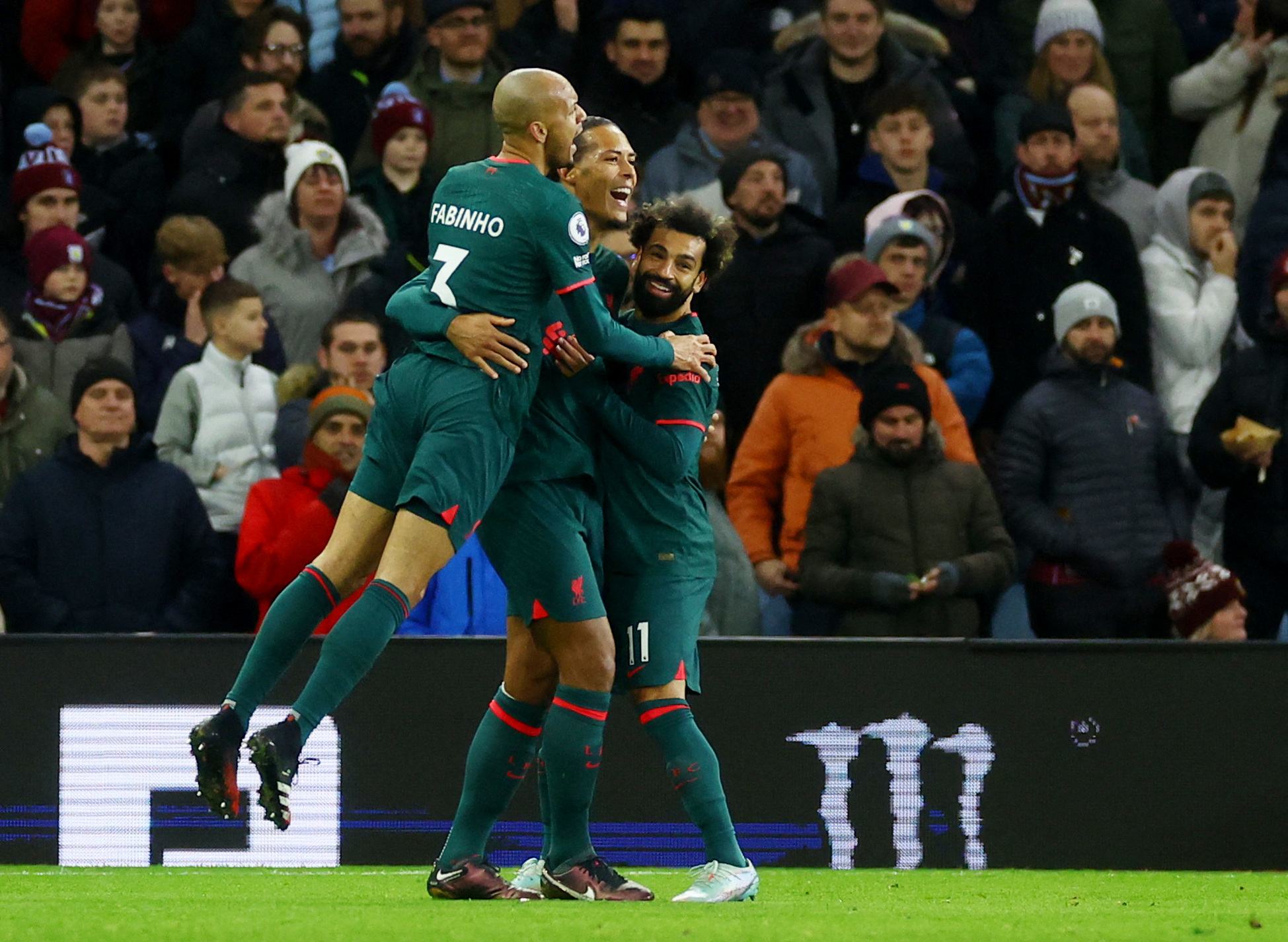 Soccer Football - Premier League - Aston Villa v Liverpool - Villa Park, Birmingham, Britain - December 26, 2022 Liverpool's Virgil van Dijk celebrates scoring their second goal with Fabinho and Mohamed Salah Action Images via Reuters