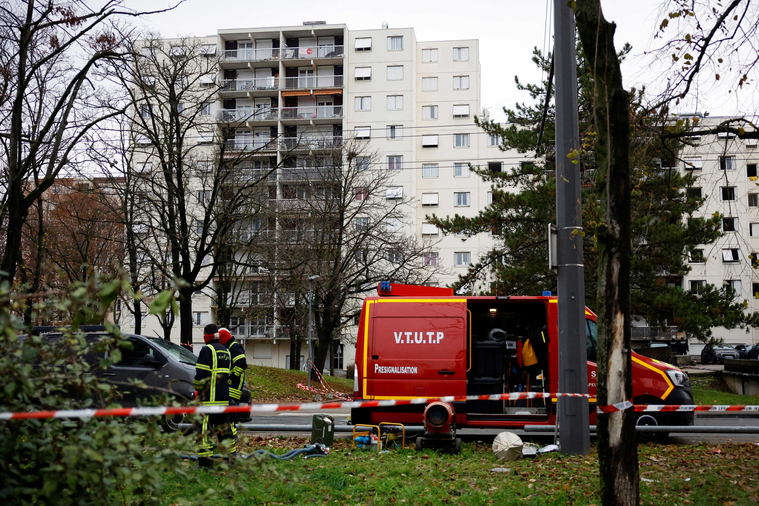 French firefighters work at the scene of a massive building fire where 10 people died and 14 injured in Vaulx-en-Velin, near Lyon, France, December 16, 2022. REUTERS