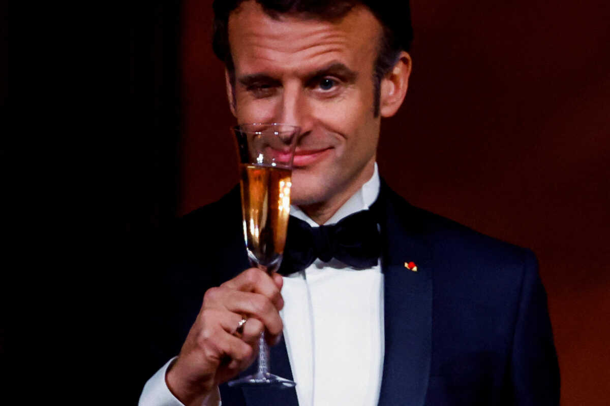 France's President Emmanuel Macron makes a toast, as the Bidens host the Macrons for a State Dinner at the White House, in Washington, U.S., December 1, 2022.  REUTERS