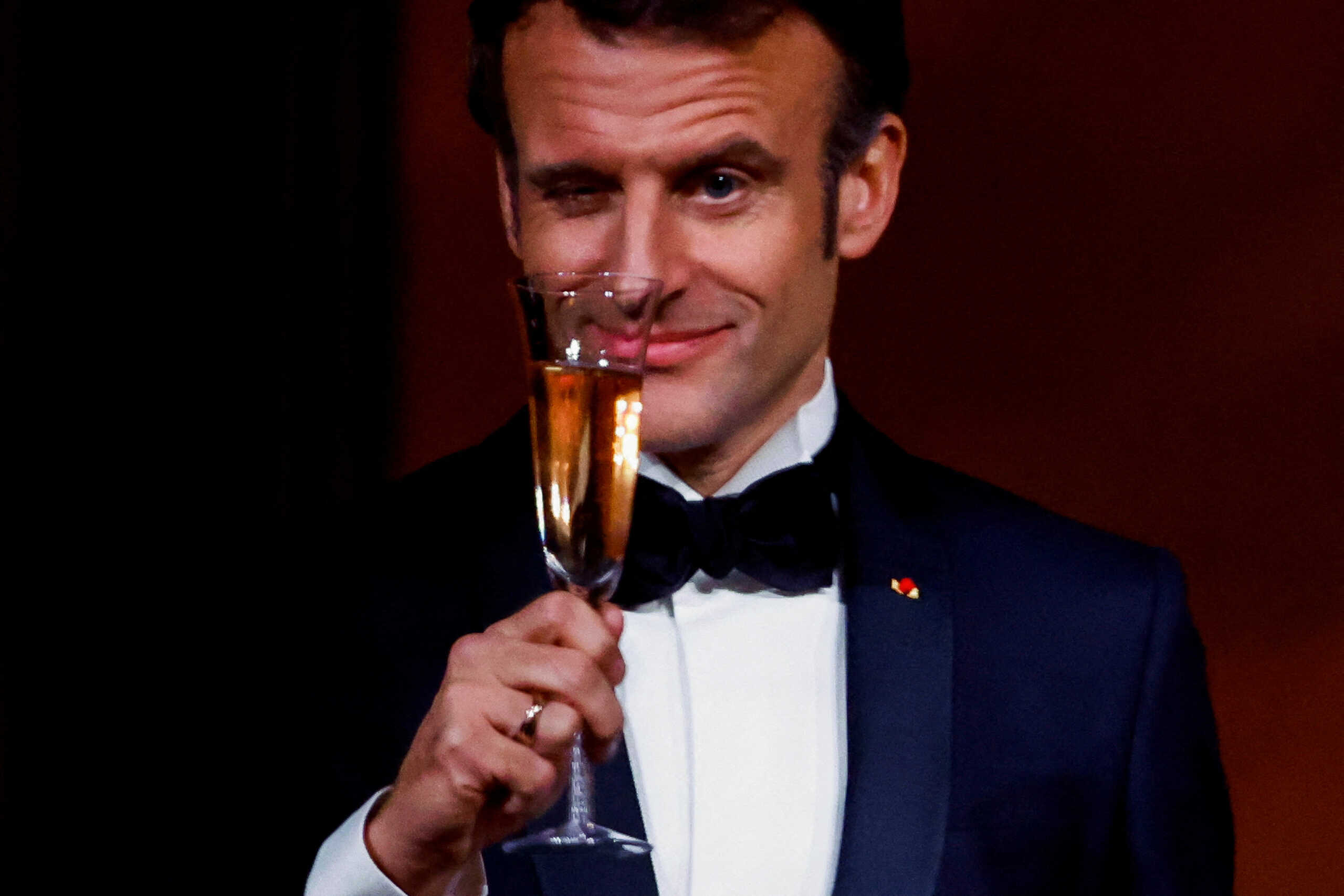 France's President Emmanuel Macron makes a toast, as the Bidens host the Macrons for a State Dinner at the White House, in Washington, U.S., December 1, 2022.  REUTERS