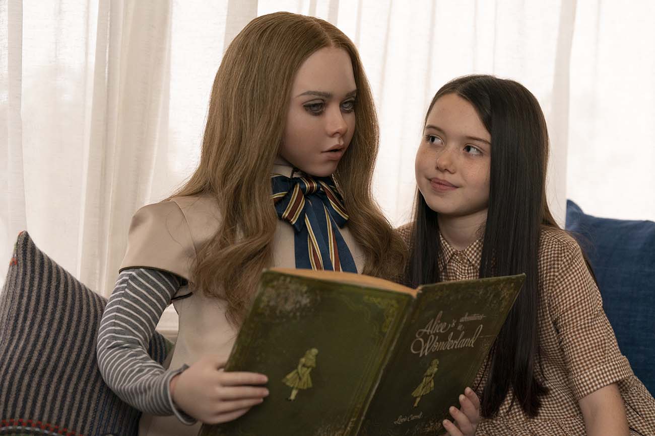 (from left) M3GAN and Cady (Violet McGraw) in M3GAN, directed by Gerard Johnstone.
