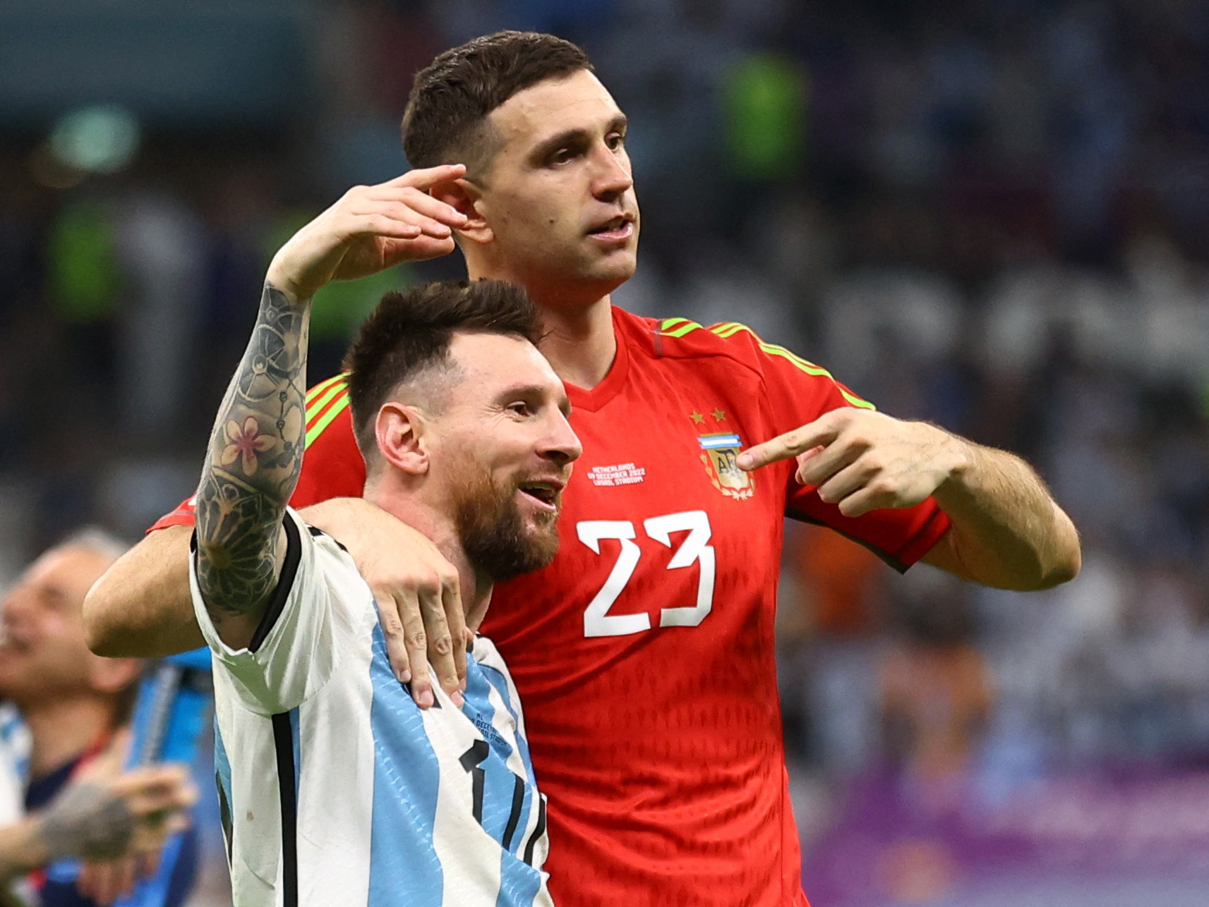 Soccer Football - FIFA World Cup Qatar 2022 - Quarter Final - Netherlands v Argentina - Lusail Stadium, Lusail, Qatar - December 10, 2022   Argentina's Lionel Messi and Emiliano Martinez celebrate qualifying for the Semi Finals REUTERS