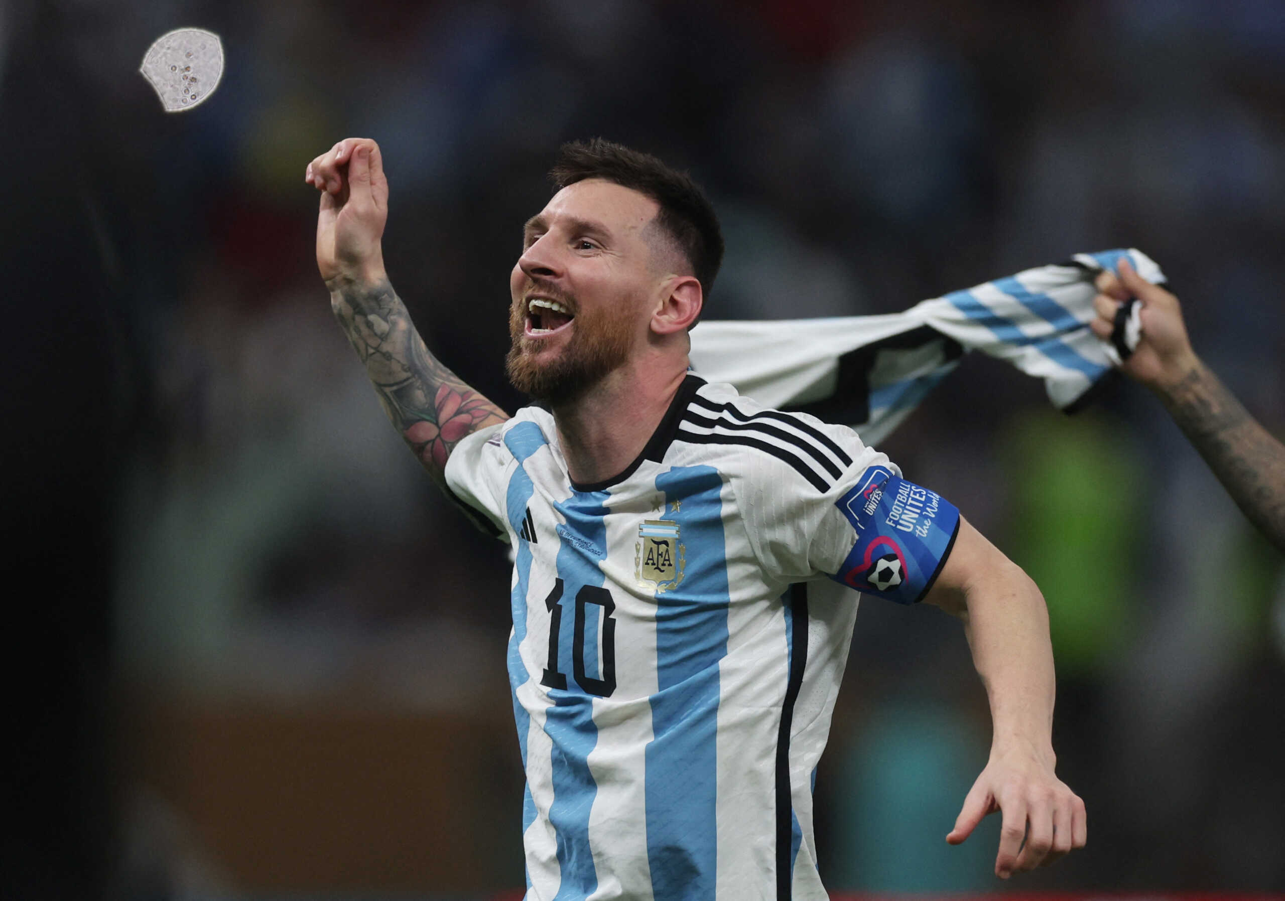 Soccer Football - FIFA World Cup Qatar 2022 - Final - Argentina v France - Lusail Stadium, Lusail, Qatar - December 18, 2022 Argentina's Lionel Messi celebrates after winning the World Cup REUTERS