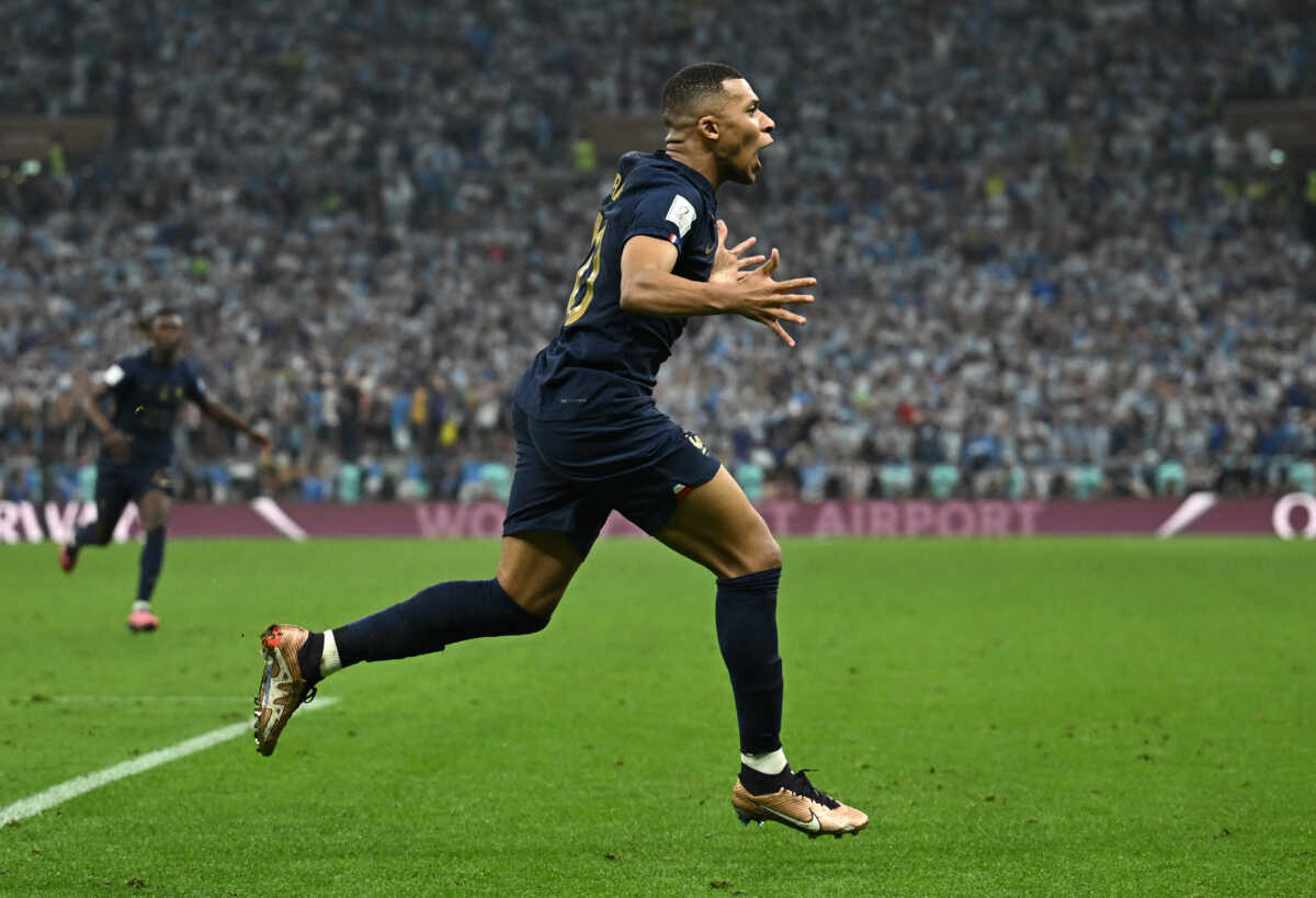 Soccer Football - FIFA World Cup Qatar 2022 - Final - Argentina v France - Lusail Stadium, Lusail, Qatar - December 18, 2022  France's Kylian Mbappe celebrates scoring their second goal REUTERS
