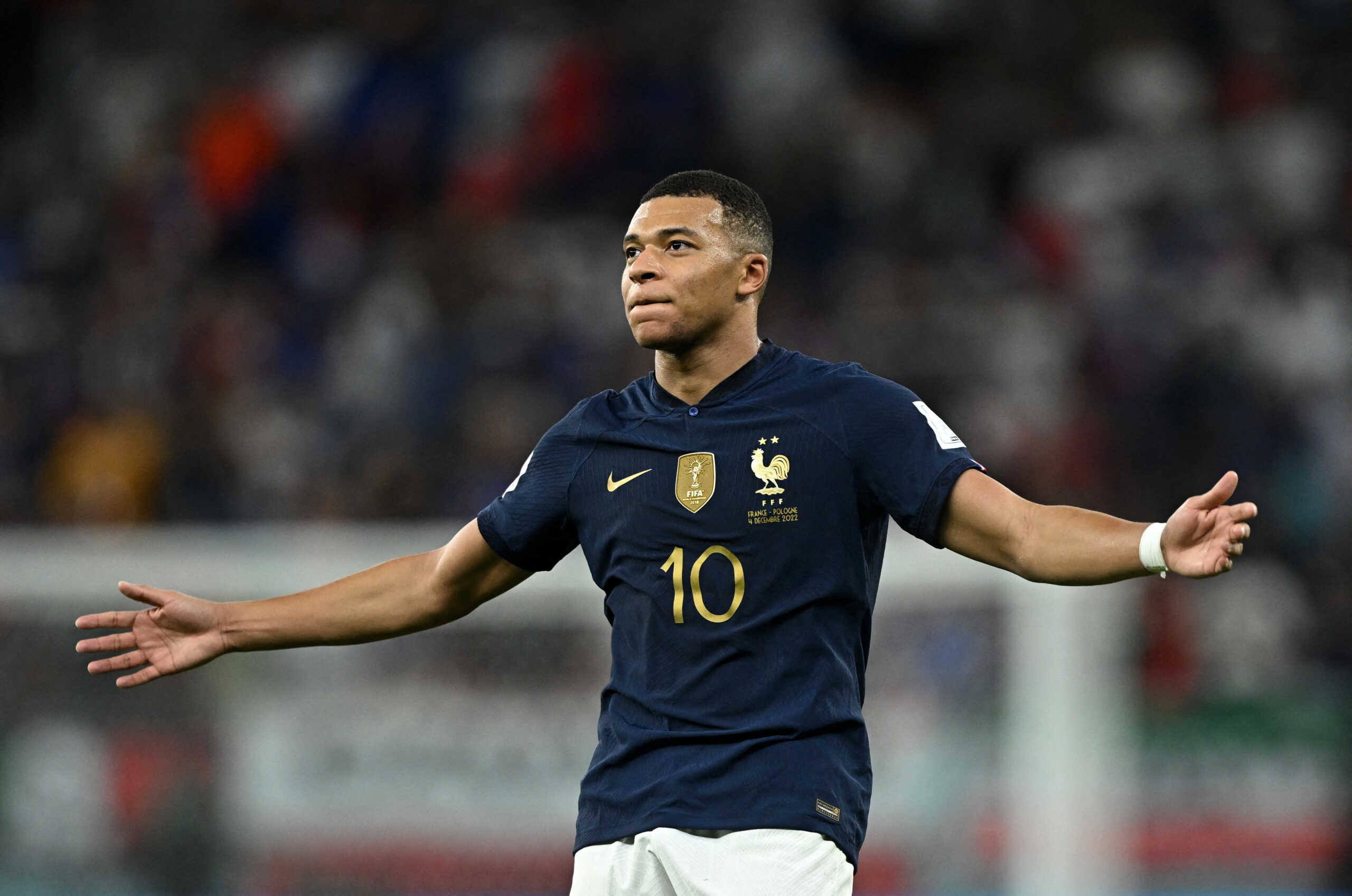 Soccer Football - FIFA World Cup Qatar 2022 - Round of 16 - France v Poland - Al Thumama Stadium, Doha, Qatar - December 4, 2022 France's Kylian Mbappe celebrates scoring their second goal REUTERS