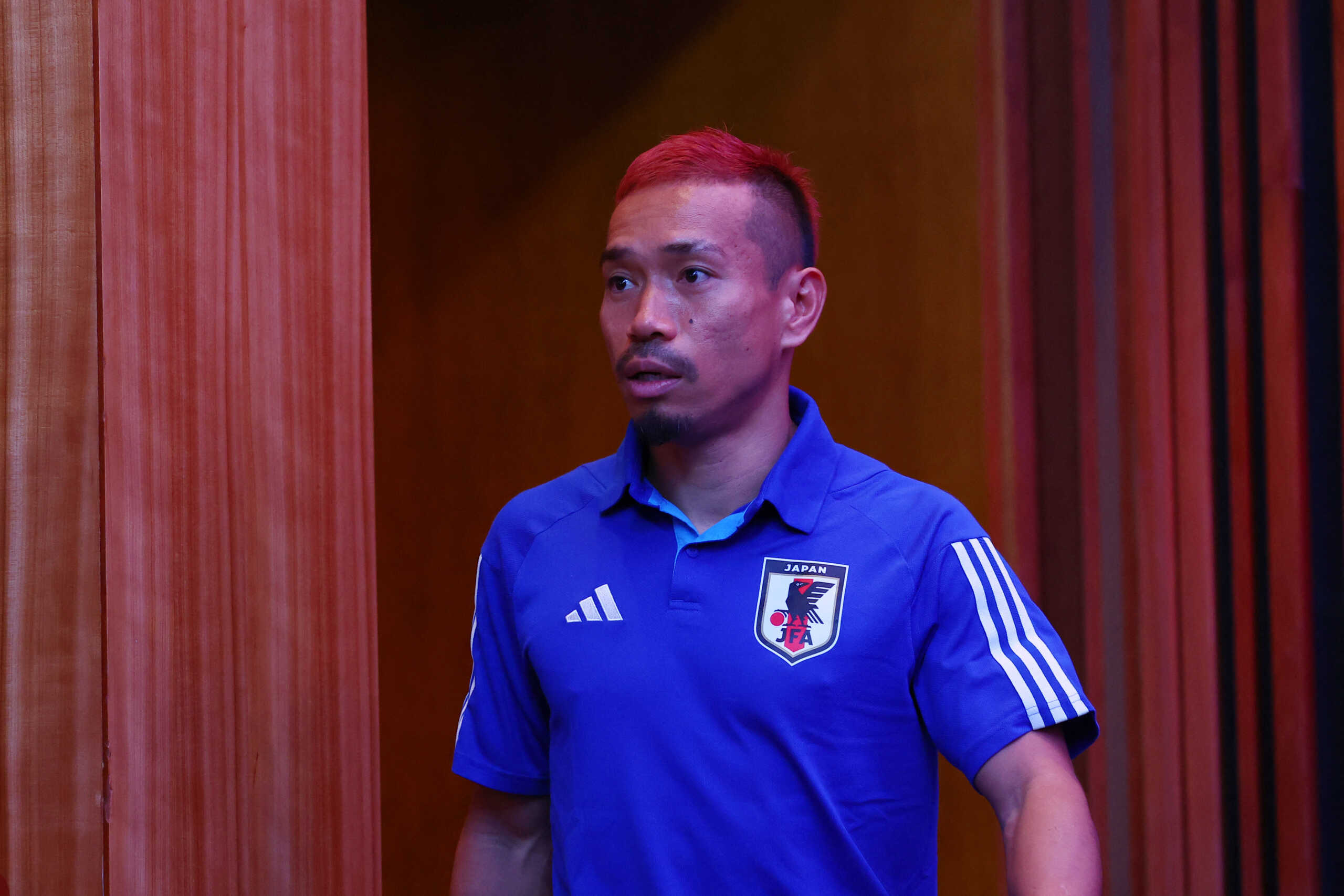 Soccer Football - FIFA World Cup Qatar 2022 - Japan Press Conference - Main Media Center, Doha, Qatar - December 4, 2022 Japan's Yuto Nagatomo arrives for the press conference REUTERS