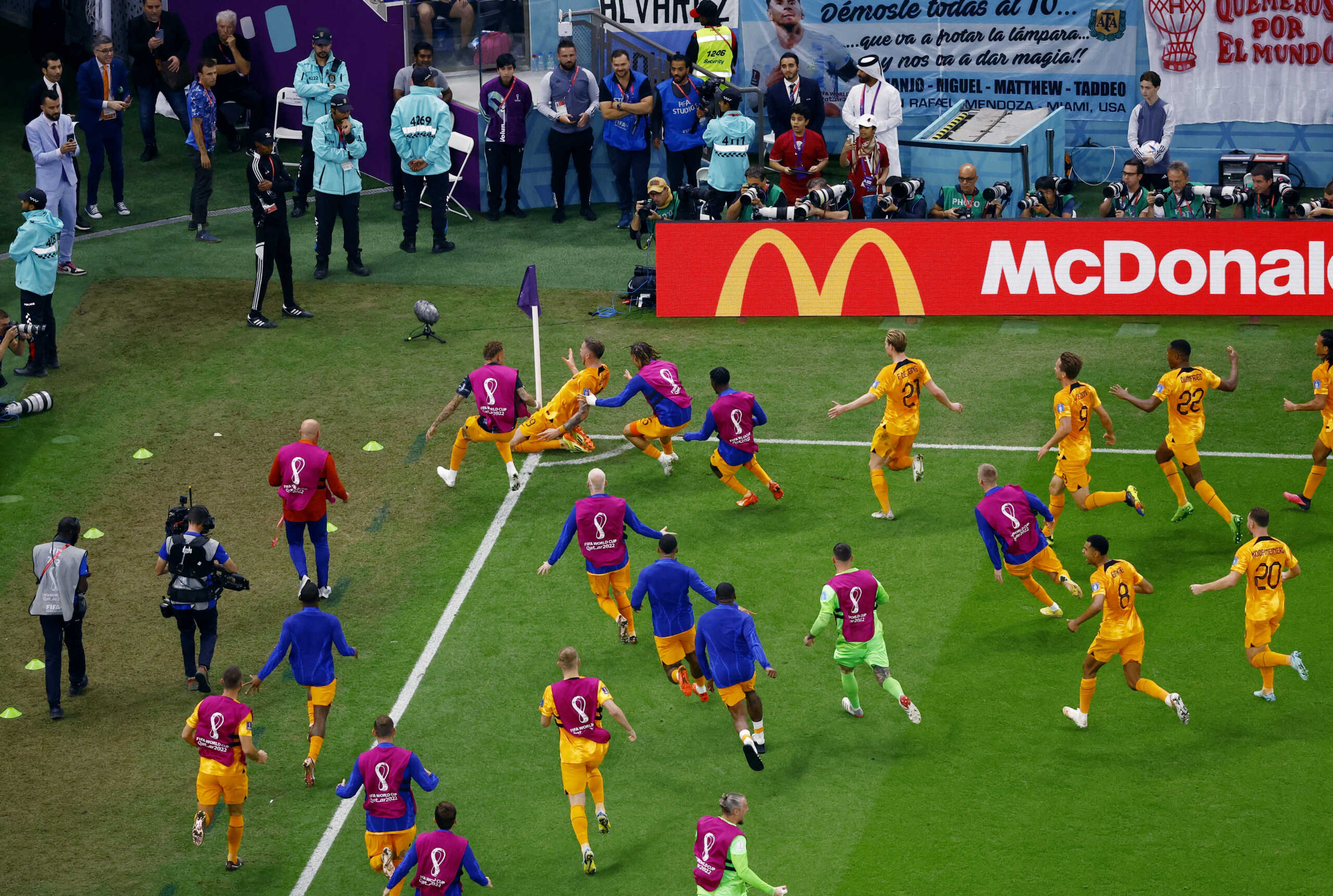 Soccer Football - FIFA World Cup Qatar 2022 - Quarter Final - Netherlands v Argentina - Lusail Stadium, Lusail, Qatar - December 10, 2022 Netherlands' Wout Weghorst celebrates scoring their second goal with teammates REUTERS