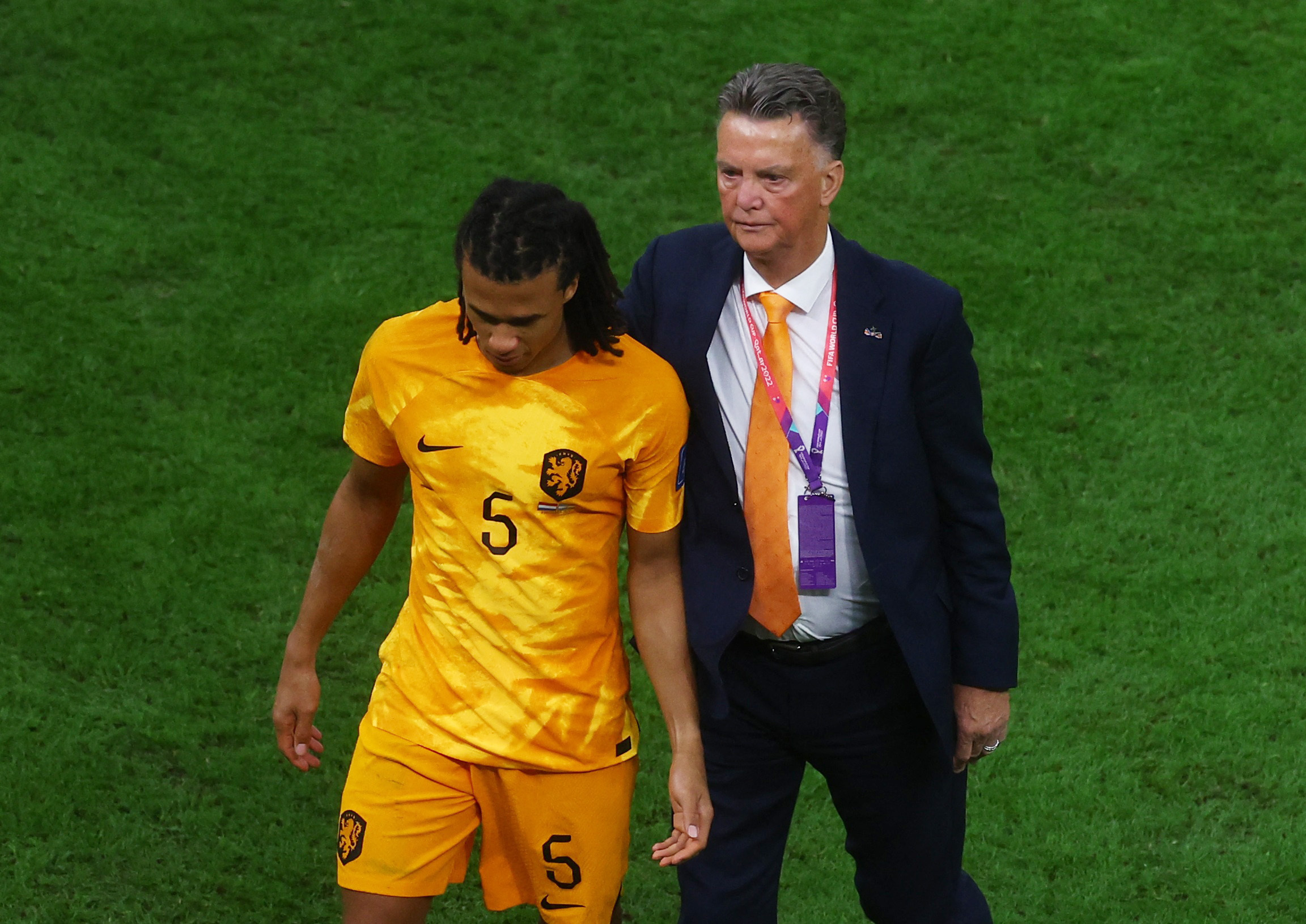 Soccer Football - FIFA World Cup Qatar 2022 - Quarter Final - Netherlands v Argentina - Lusail Stadium, Lusail, Qatar - December 10, 2022 Netherlands coach Louis van Gaal and Nathan Ake look dejected after the penalty shootout as Netherlands are eliminated from the World Cup REUTERS