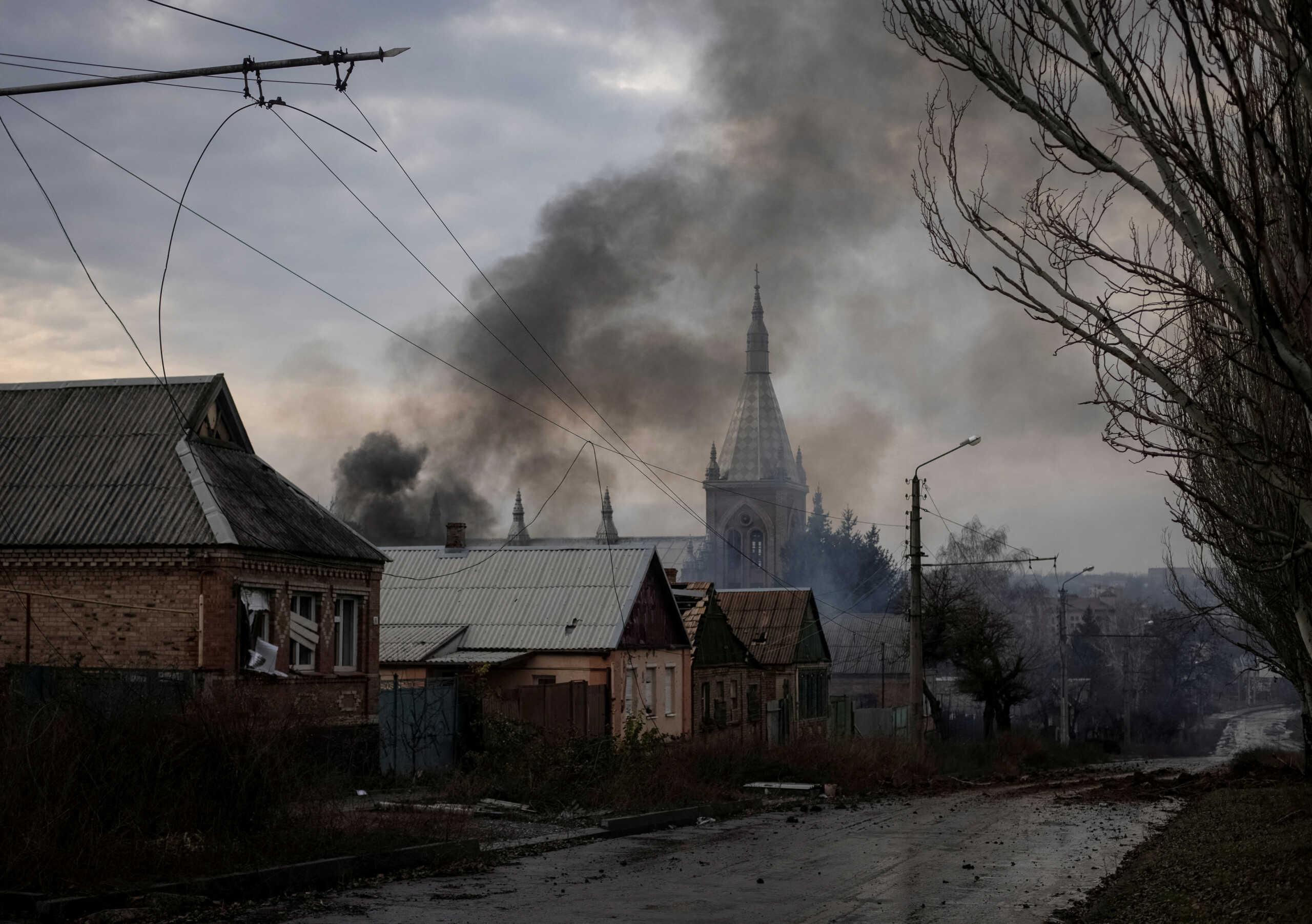 FILE PHOTO: Residential houses are damaged by a Russian military strike, amid Russia's attack on Ukraine, in Bakhmut in Donetsk region, Ukraine, December 9, 2022. REUTERS