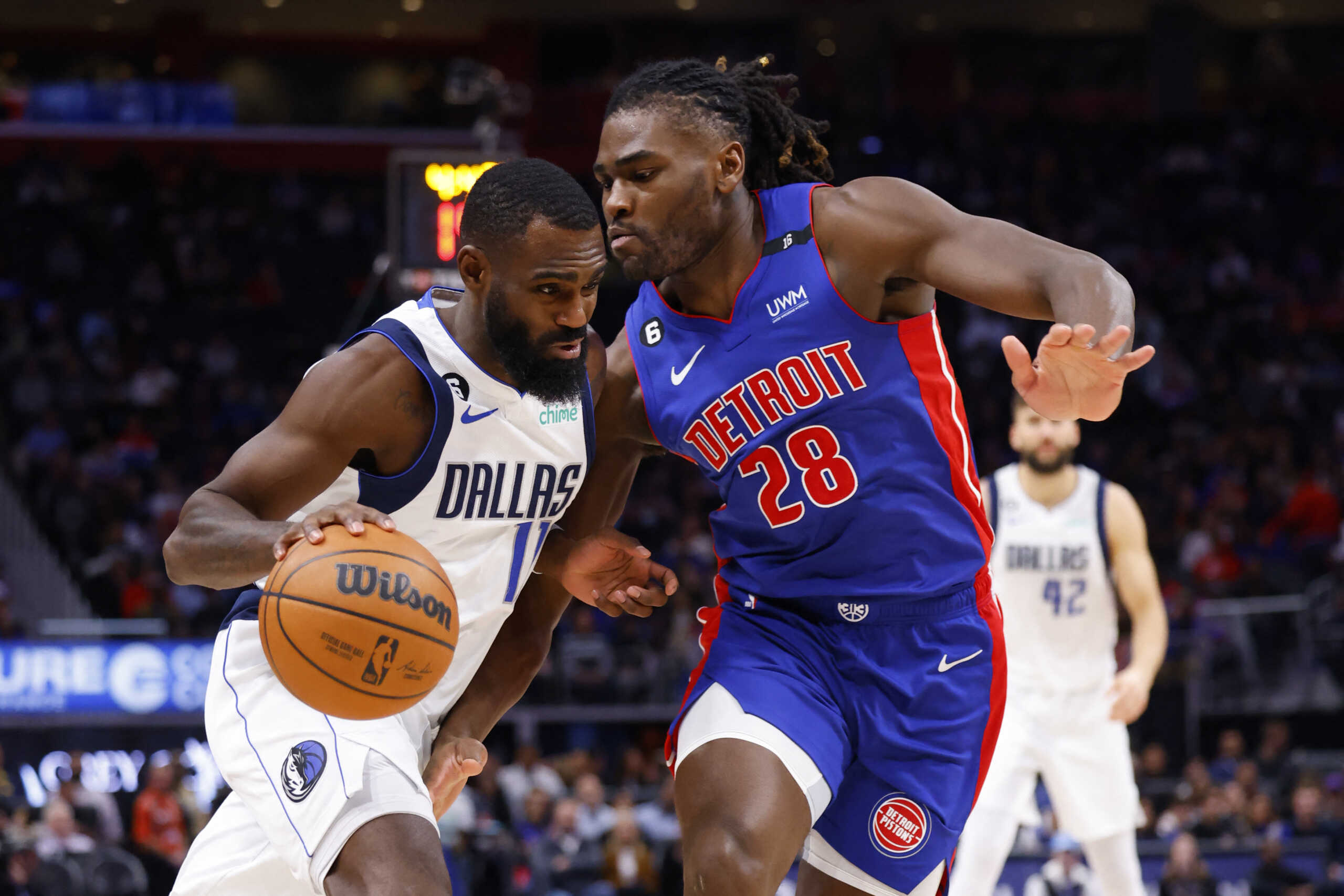 Dec 1, 2022; Detroit, Michigan, USA; Dallas Mavericks forward Tim Hardaway Jr. (11) is defended by Detroit Pistons center Isaiah Stewart (28) in the first half at Little Caesars Arena. Mandatory Credit: Rick Osentoski-USA TODAY Sports