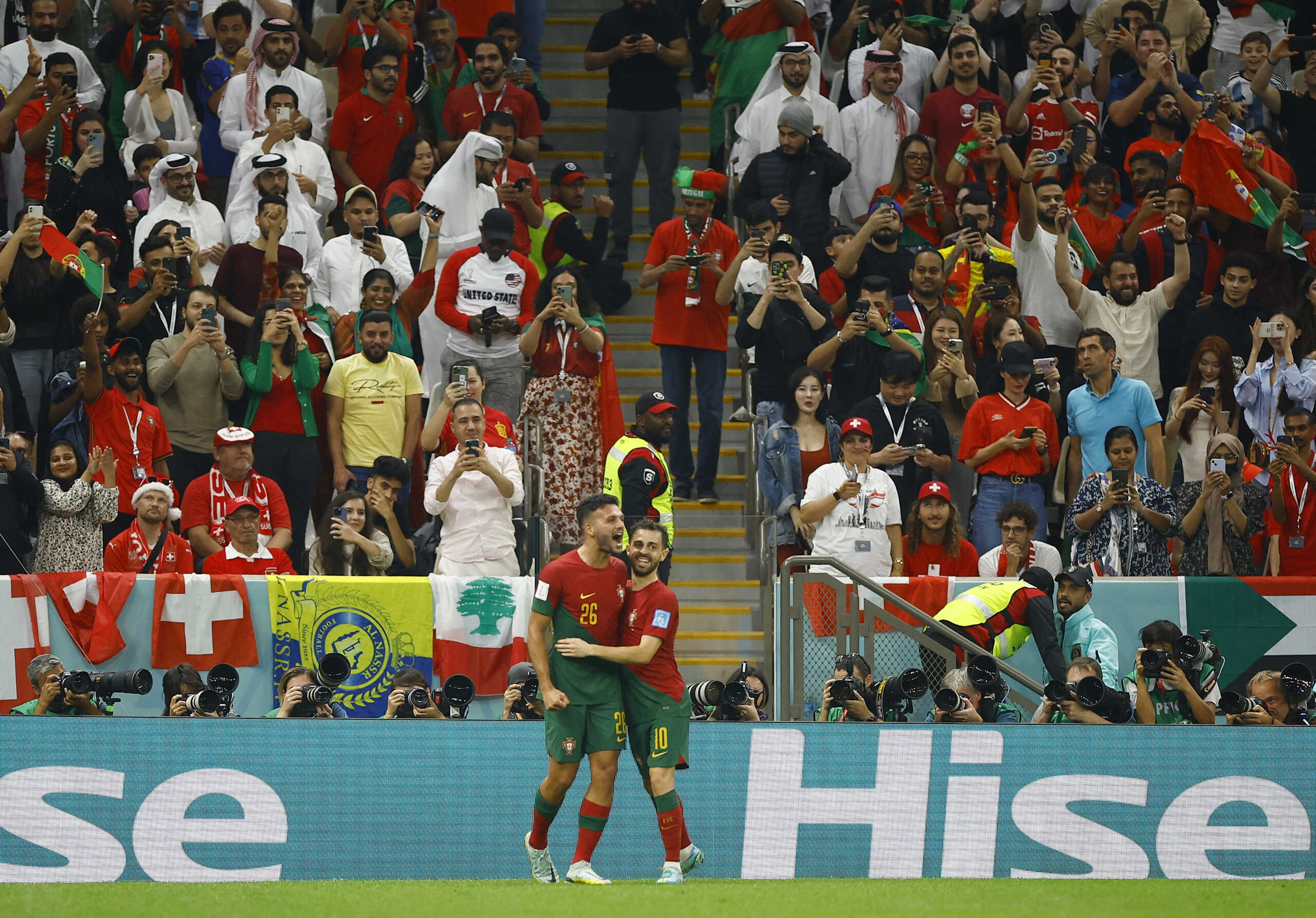 Soccer Football - FIFA World Cup Qatar 2022 - Round of 16 - Portugal v Switzerland - Lusail Stadium, Lusail, Qatar - December 6, 2022 Portugal's Goncalo Ramos celebrates scoring their fifth goal and his hat-trick with Bernardo Silva REUTERS