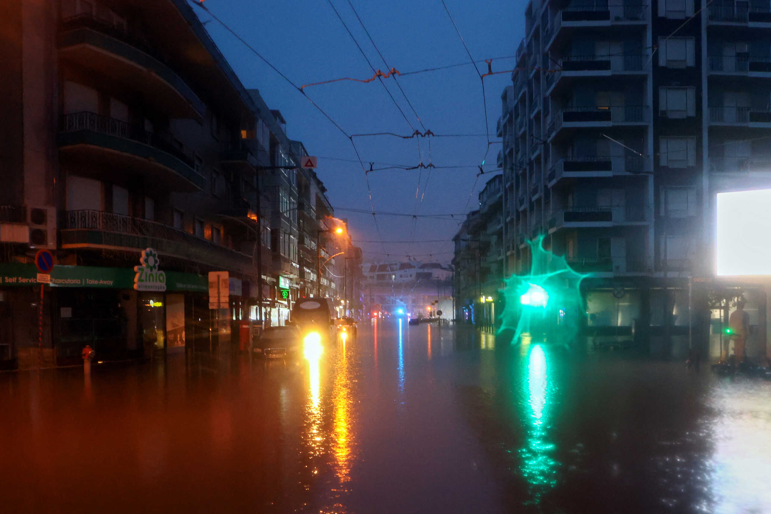 A view shows a flooded street in Alges, Oeiras, Portugal, December 13, 2022. REUTERS