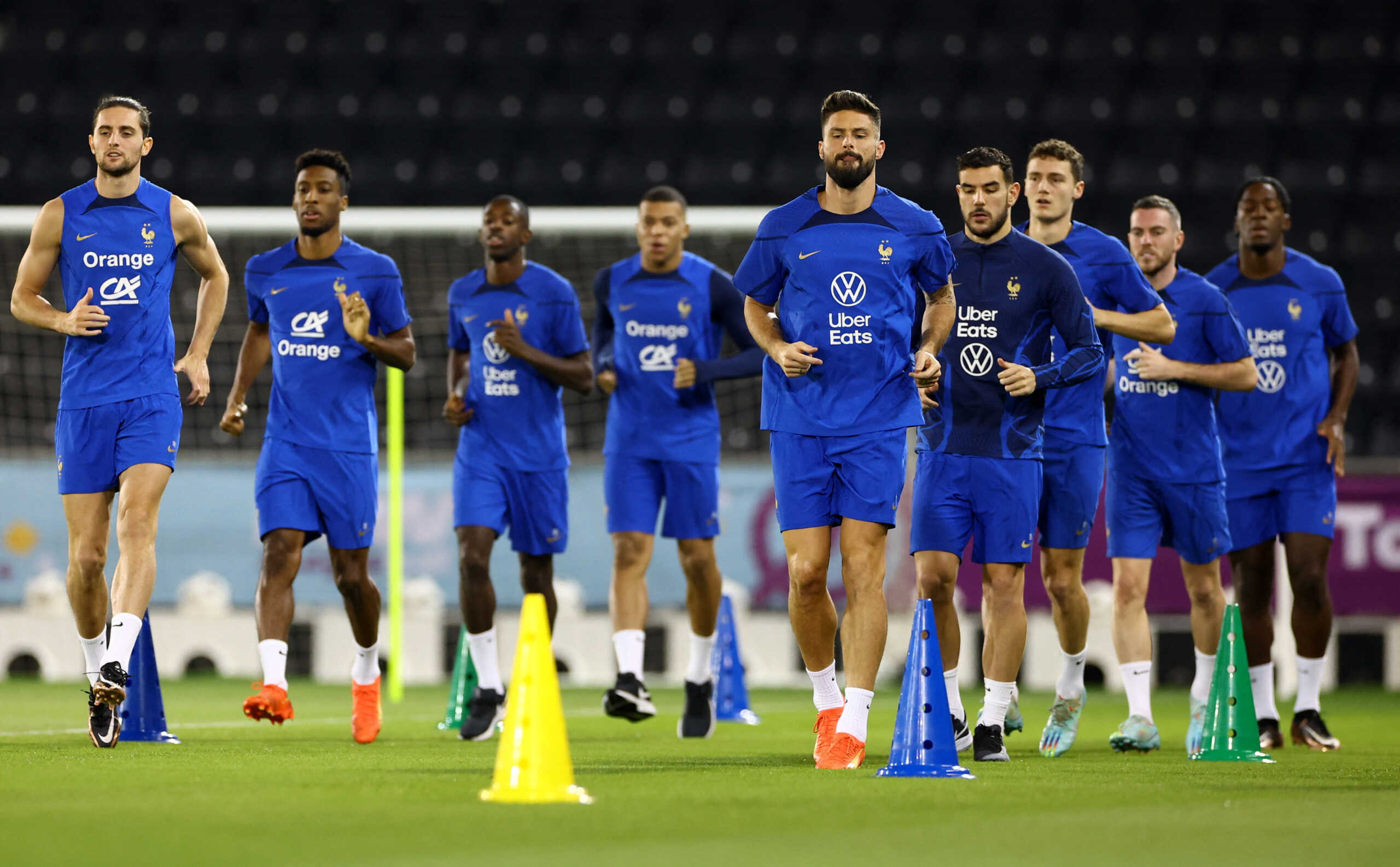Soccer Football - FIFA World Cup Qatar 2022 - France Training - Al Sadd SC Stadium, Doha, Qatar - December 12, 2022  France's Olivier Giroud, Adrien Rabiot, Theo Hernandez and teammates during training REUTERS