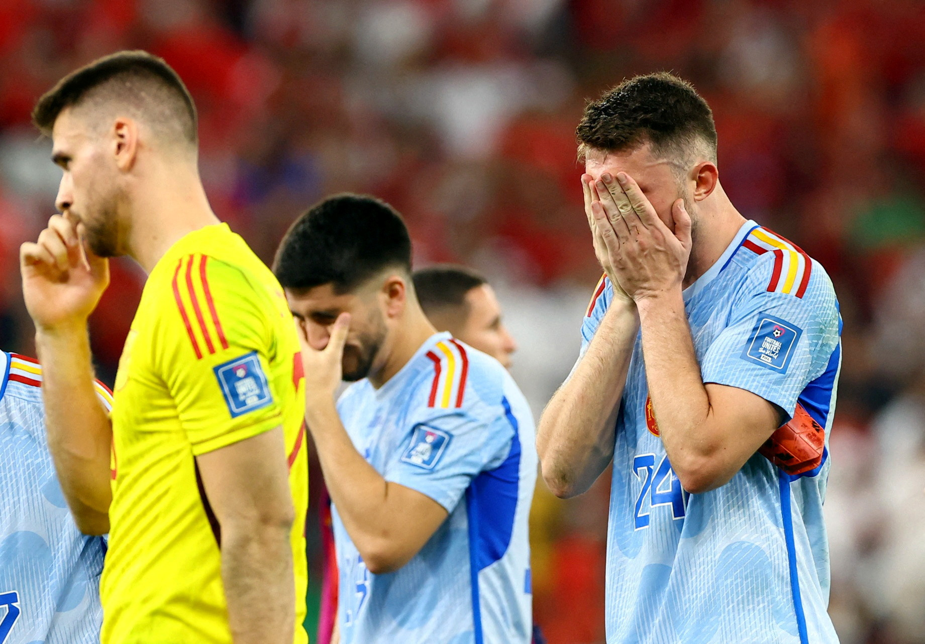 Soccer Football - FIFA World Cup Qatar 2022 - Round of 16 - Morocco v Spain - Education City Stadium, Al Rayyan, Qatar - December 6, 2022 Spain's Aymeric Laporte looks dejected after the match REUTERS