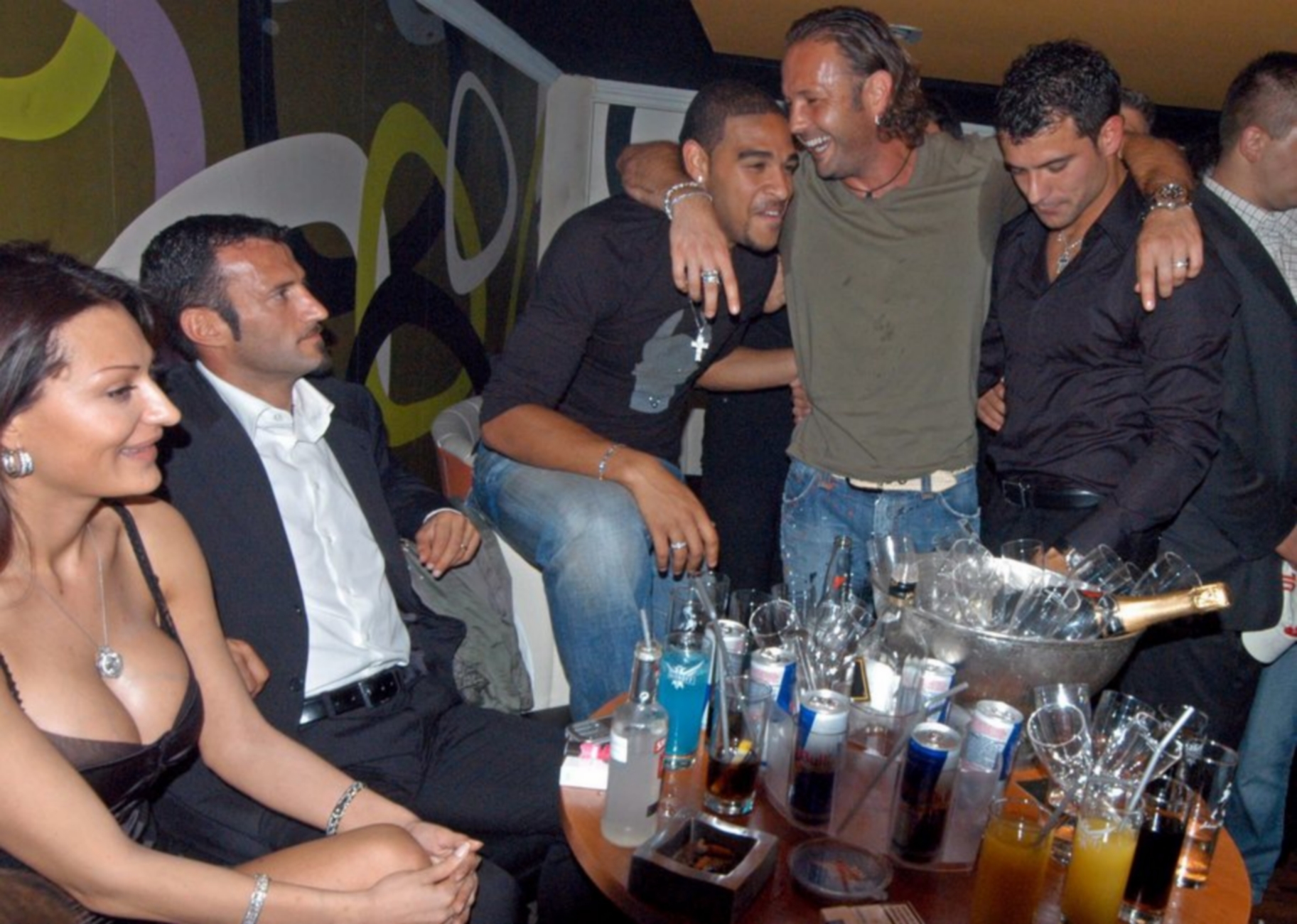 epa00536228 Italian Serie A stars from Inter Milan (from R to L) Dejan Stankovic, Sinisa Mihajlovic, Adriano and Giusepe Favali, accompanied by popular Serbian folk singer and widow of assassinated warlord Zeljko Raznatovic - also know as Arkan - Ceca Raznatovic, celebrate in a Belgrade night club, early Friday 23 September 2005, the launch of the new collection of 'Sweet Years',  a fashion line owned by Cristian Vieri and Paolo Maldini and represented in Serbia and Montenegro by Dejan Stankovic.  EPA