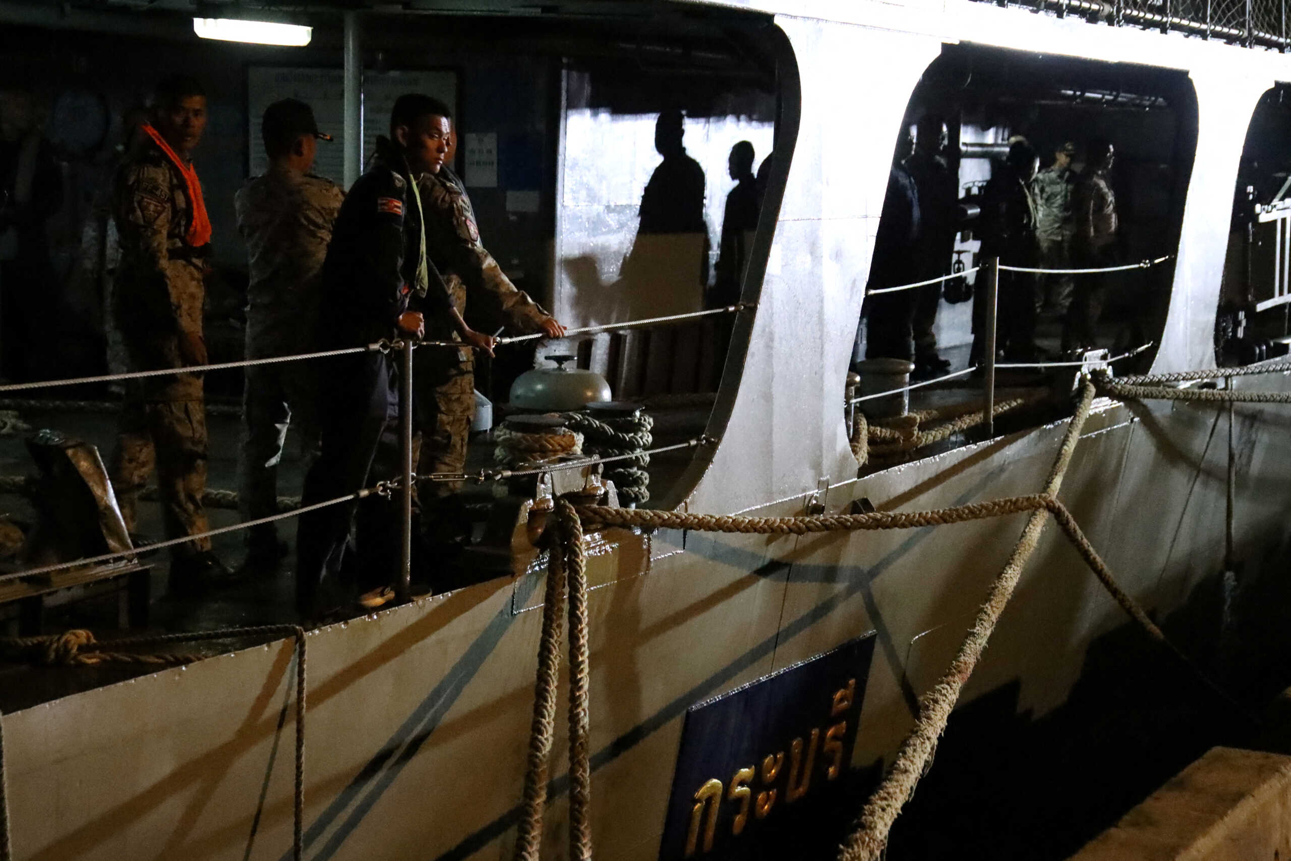 Crew members from Royal Thai Navy are seen docked as they return from a rescue mission after a Navy corvette sank in the Gulf of Thailand, in Prachuap Khiri Khan province, Thailand December 19, 2022 REUTERS