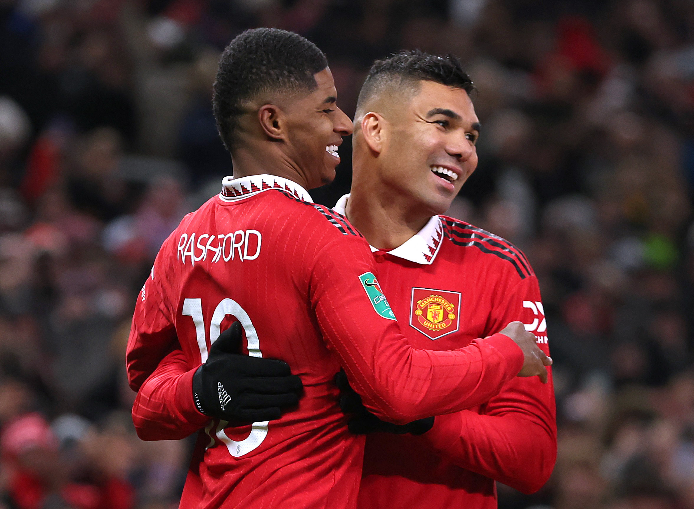Soccer Football - Carabao Cup - Round of 16 - Manchester United v Burnley - Old Trafford, Manchester, Britain - December 21, 2022 Manchester United's Marcus Rashford celebrates scoring their second goal with Casemiro Action Images via Reuters