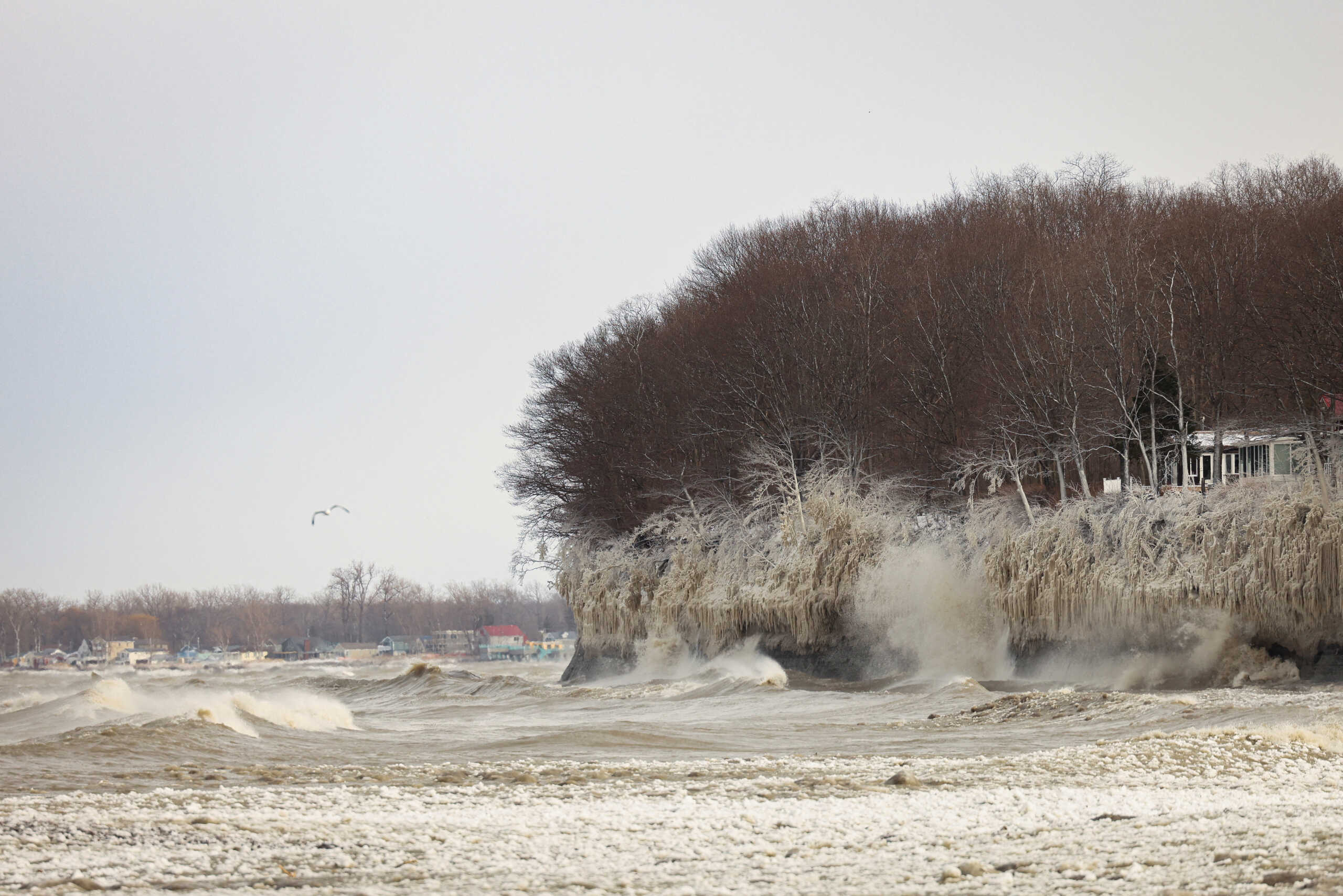 Ice forms by the spray of Lake Erie waves during a winter storm in Silver Creek, New York, U.S., December 24, 2022. REUTERS