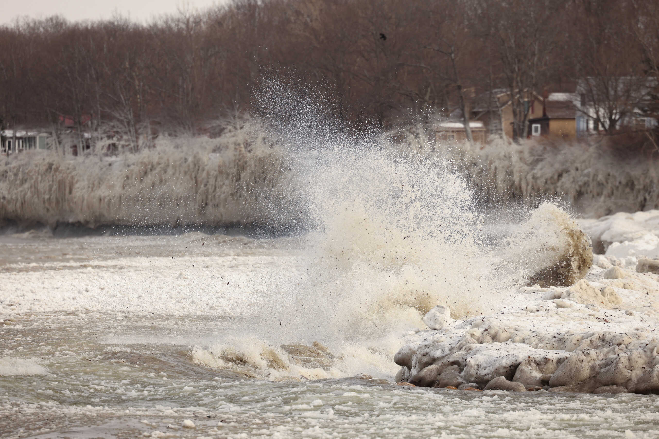 Ice forms by the spray of Lake Erie waves during a winter storm in Silver Creek, New York, U.S., December 24, 2022. REUTERS