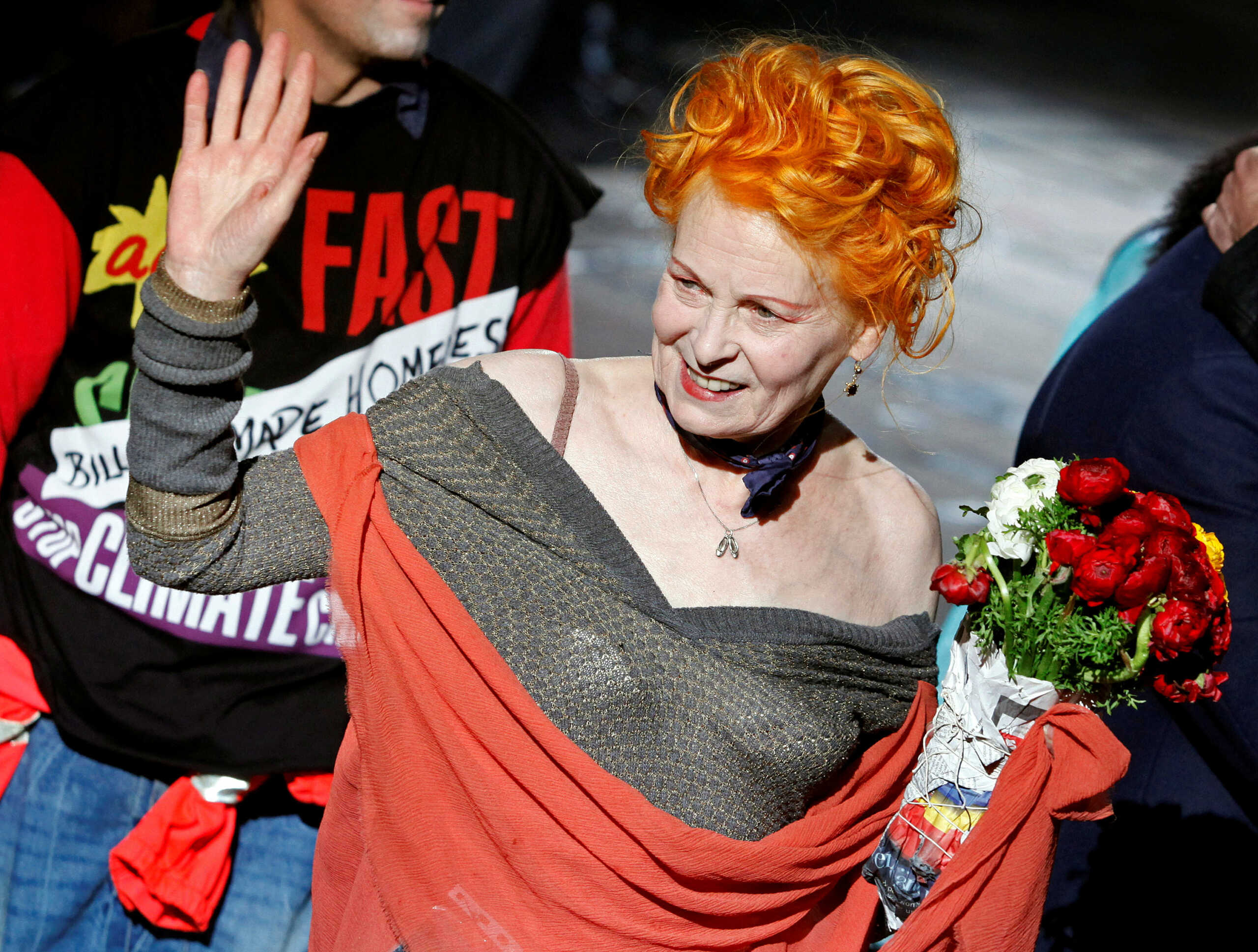 FILE PHOTO: British designer Vivienne Westwood acknowledges the applause at the end of her Fall