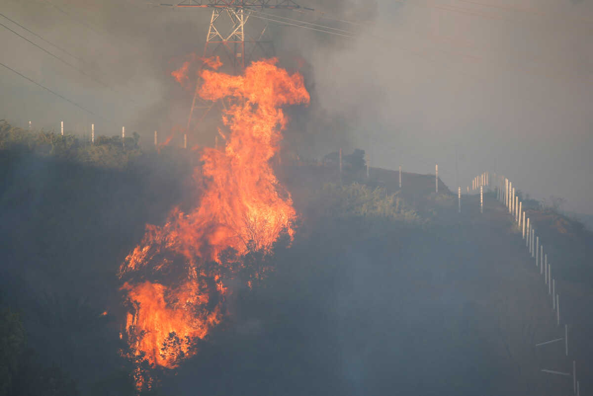 A wildfire is seen in Vina del Mar, Chile  December 22, 2022. REUTERS