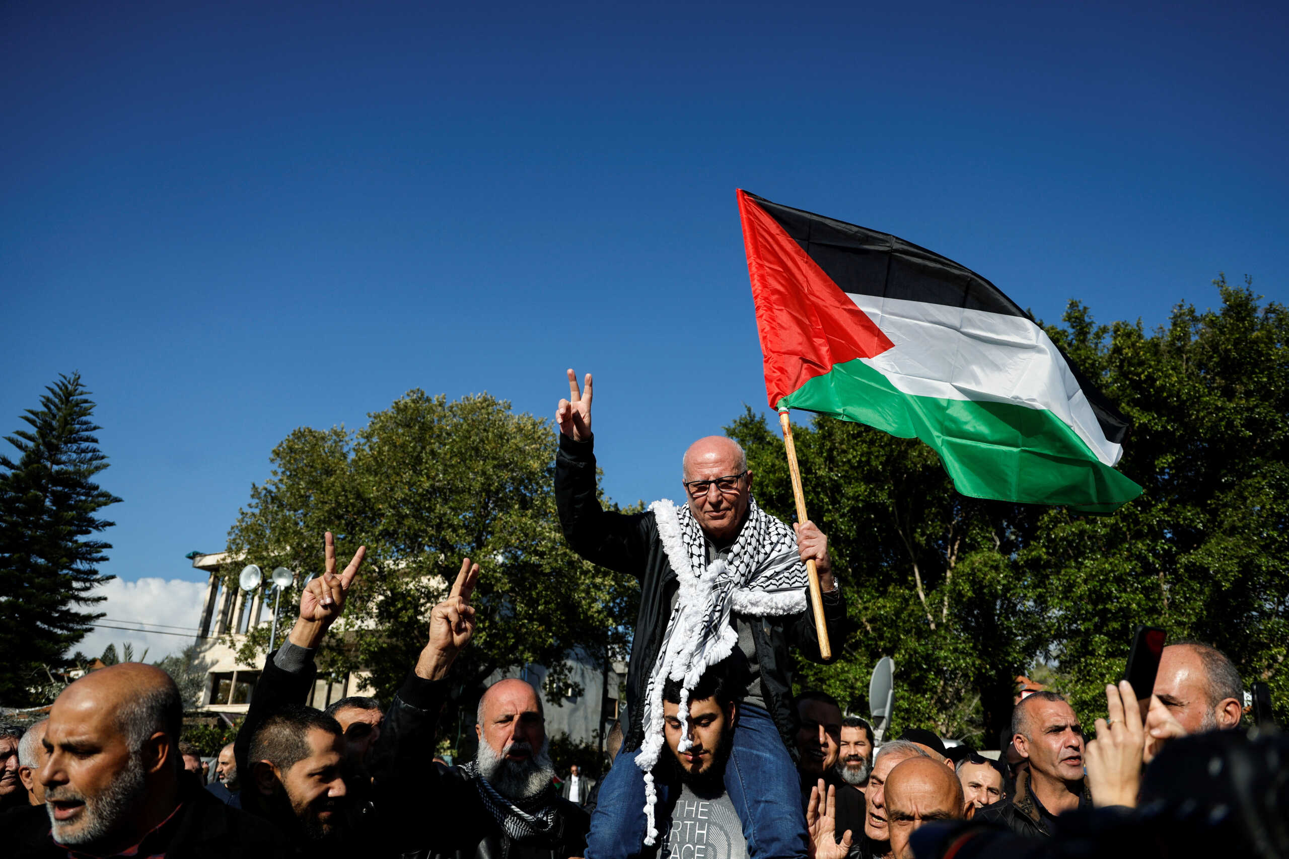 Longest serving Palestinian prisoner, Karim Younis, gestures as he is welcomed at his village, after he was freed from Israeli jail earlier today, in Ara, Israel January 5, 2023. REUTERS