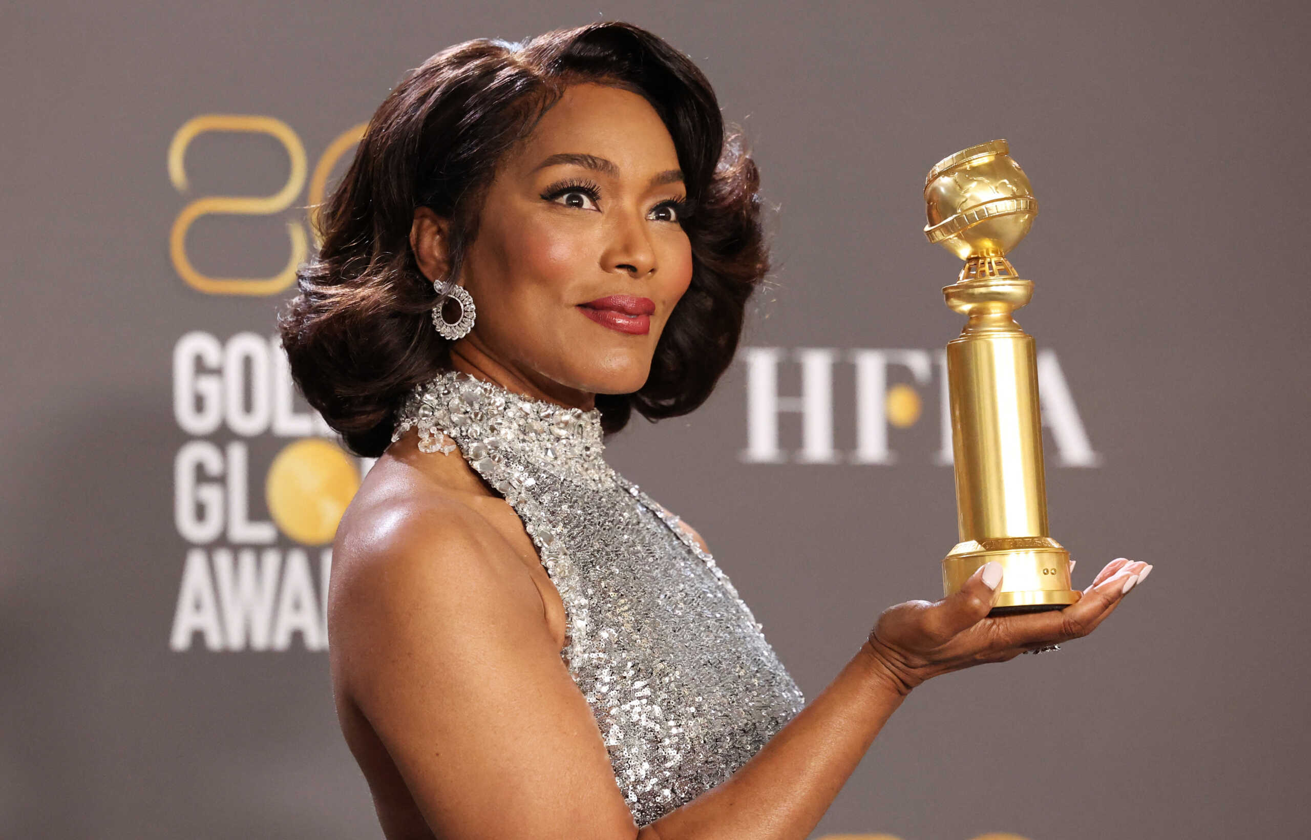 Angela Bassett poses with her award for Best Supporting Actress - Motion Picture in "Black Panther: Wakanda Forever" at the 80th Annual Golden Globe Awards in Beverly Hills, California, U.S., January 10, 2023. REUTERS
