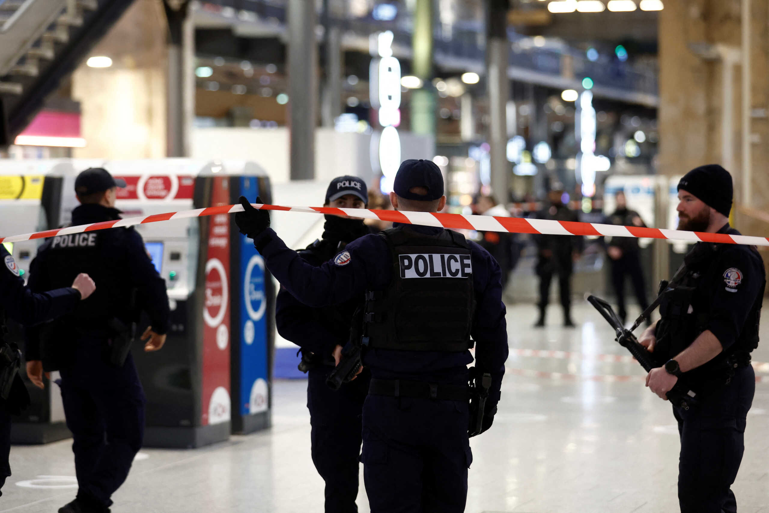 French police secure the area after a man with a knife wounded several people at the Gare du Nord train station in Paris, France, January 11, 2023. REUTERS
