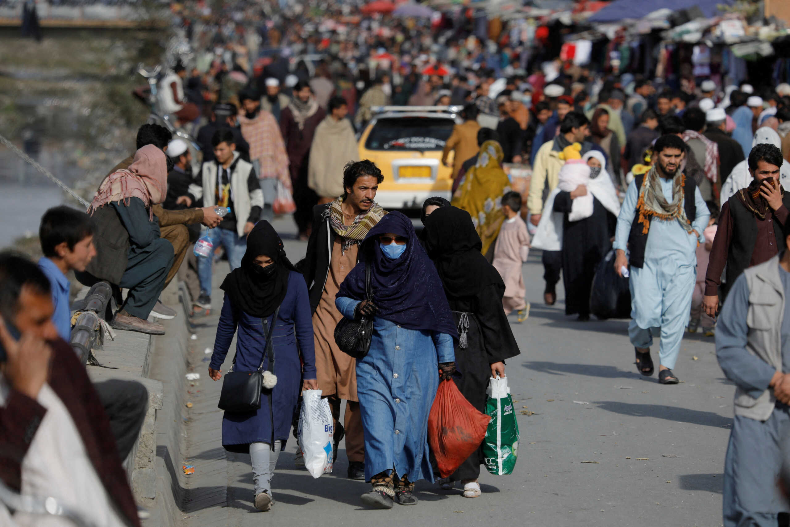 FILE PHOTO: People walk in a street in Kabul, Afghanistan, November 9, 2022. REUTERS