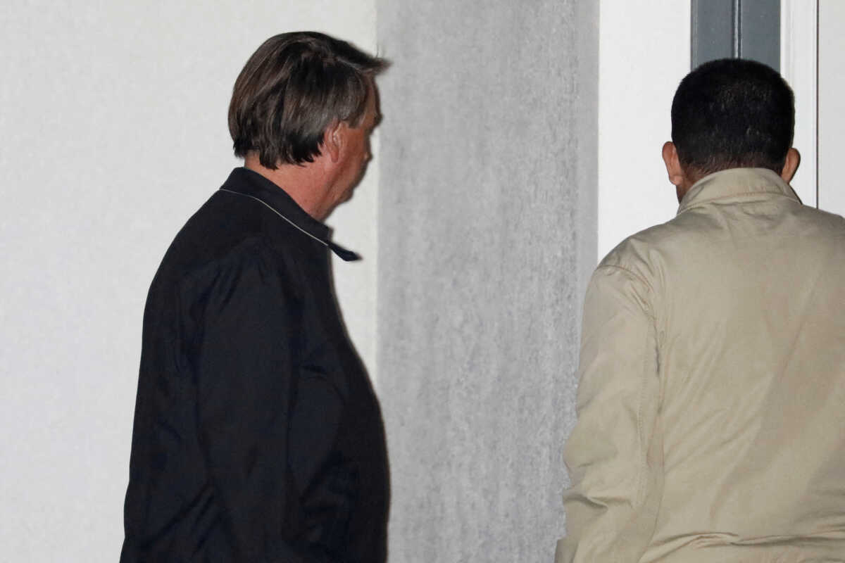 FILE PHOTO: Former Brazilian President Jair Bolsonaro arrives to the house where he is staying after being discharged from the hospital, in Kissimmee, Florida, U.S., January 10, 2023. REUTERS