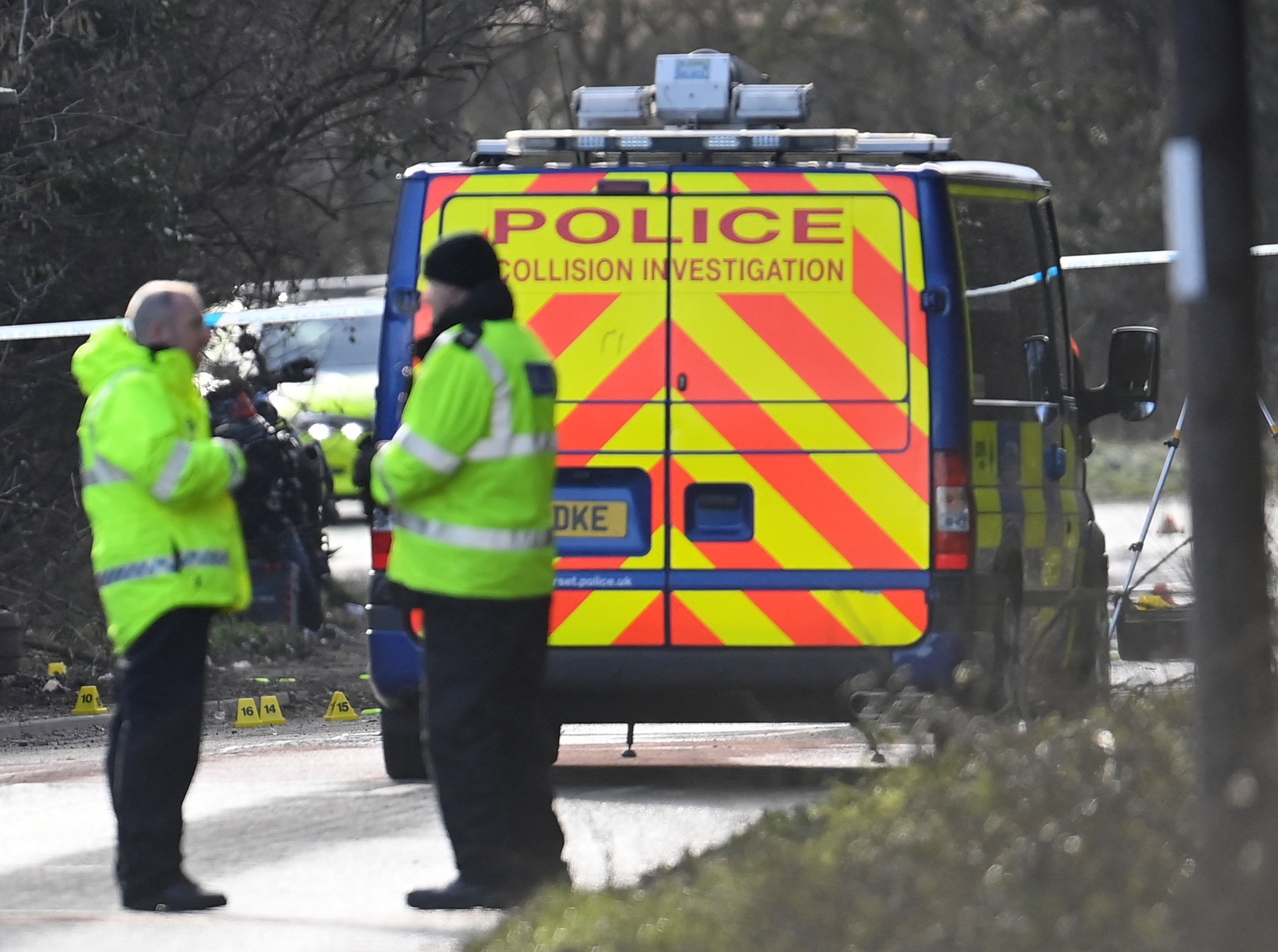 Police attend the scene of a bus crash near Cannington, Britain, January 17, 2023. REUTERS