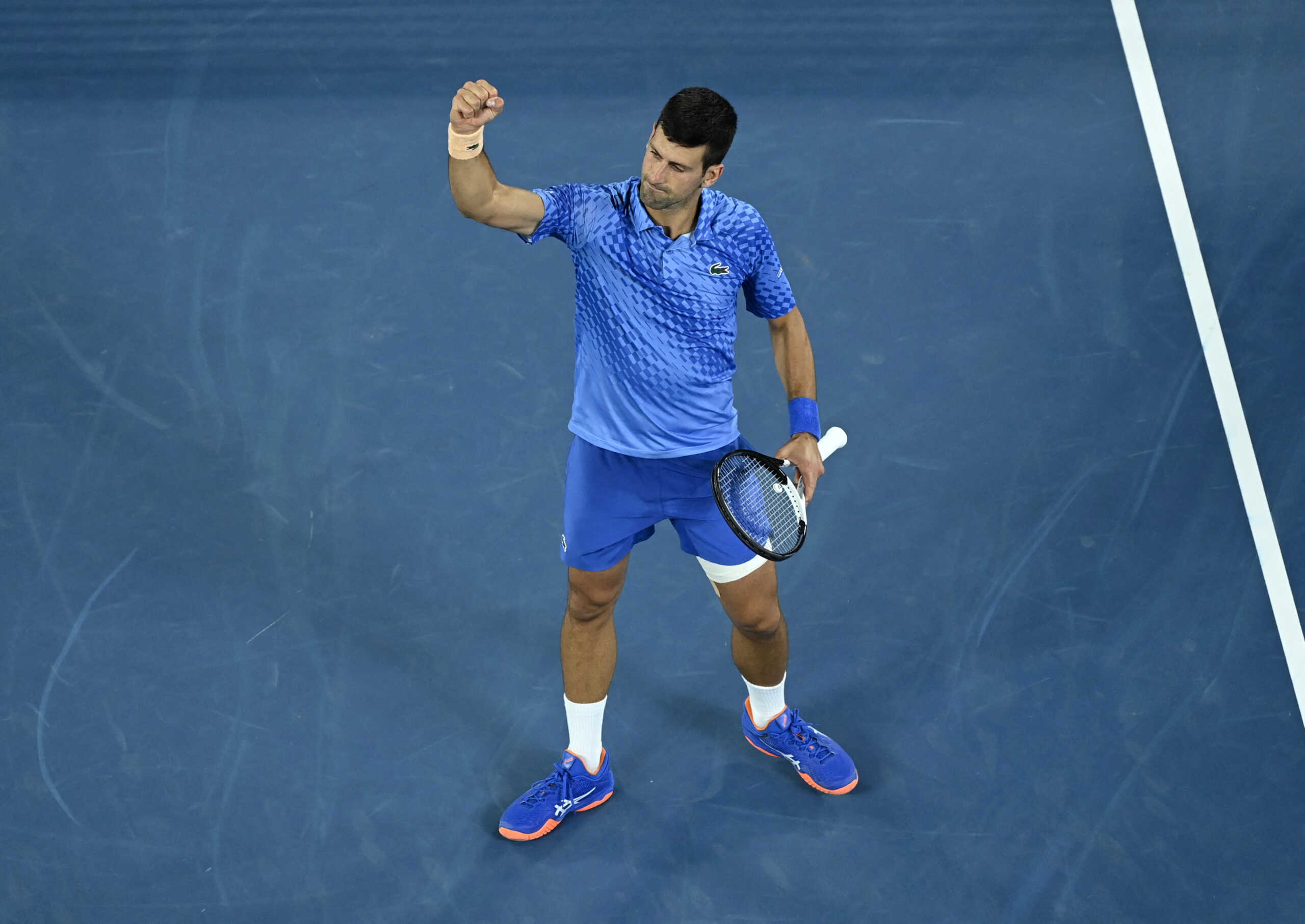 Tennis - Australian Open - Melbourne Park, Melbourne, Australia - January 21, 2023 Serbia's Novak Djokovic celebrates winning his third round match against Bulgaria's Grigor Dimitrov REUTERS