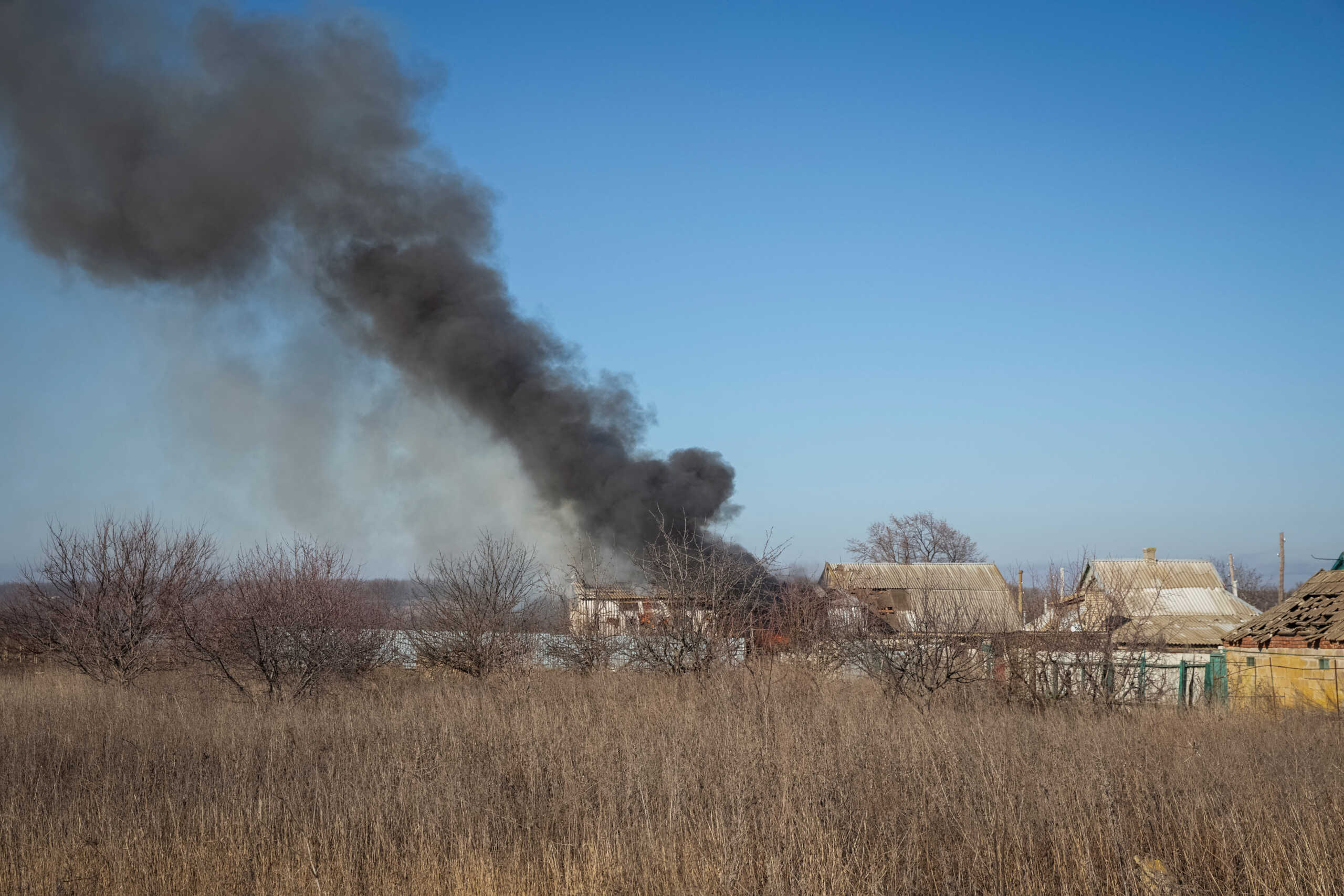 A house burns after a Russian military strike, as Russia's attack on Ukraine continues, near the city of Vuhledar, Donetsk region, Ukraine January 27, 2023. REUTERS