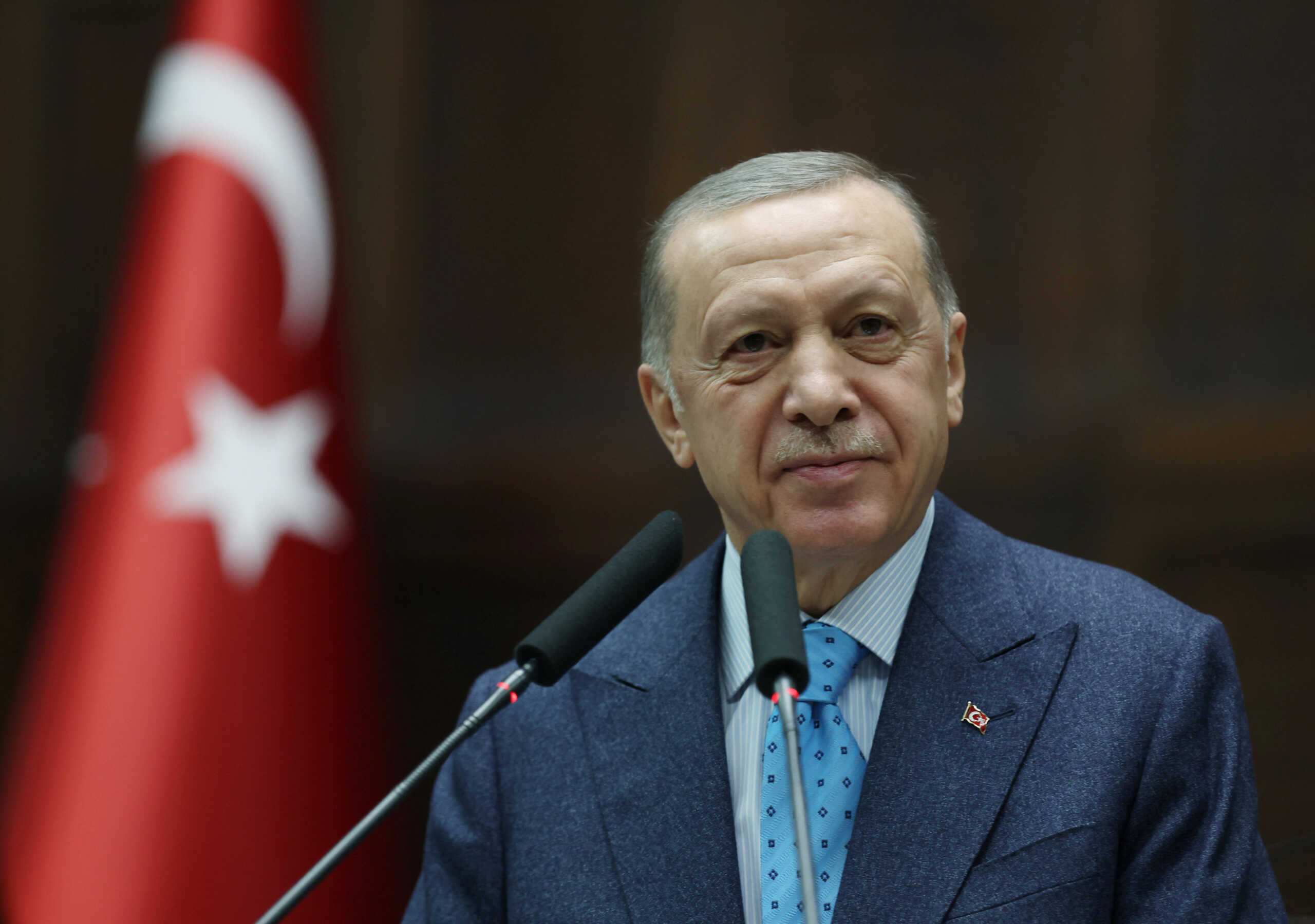 Turkish President Tayyip Erdogan addresses lawmakers of his AK Party during a meeting at the parliament in Ankara, Turkey January 18, 2023. Presidential Press Office