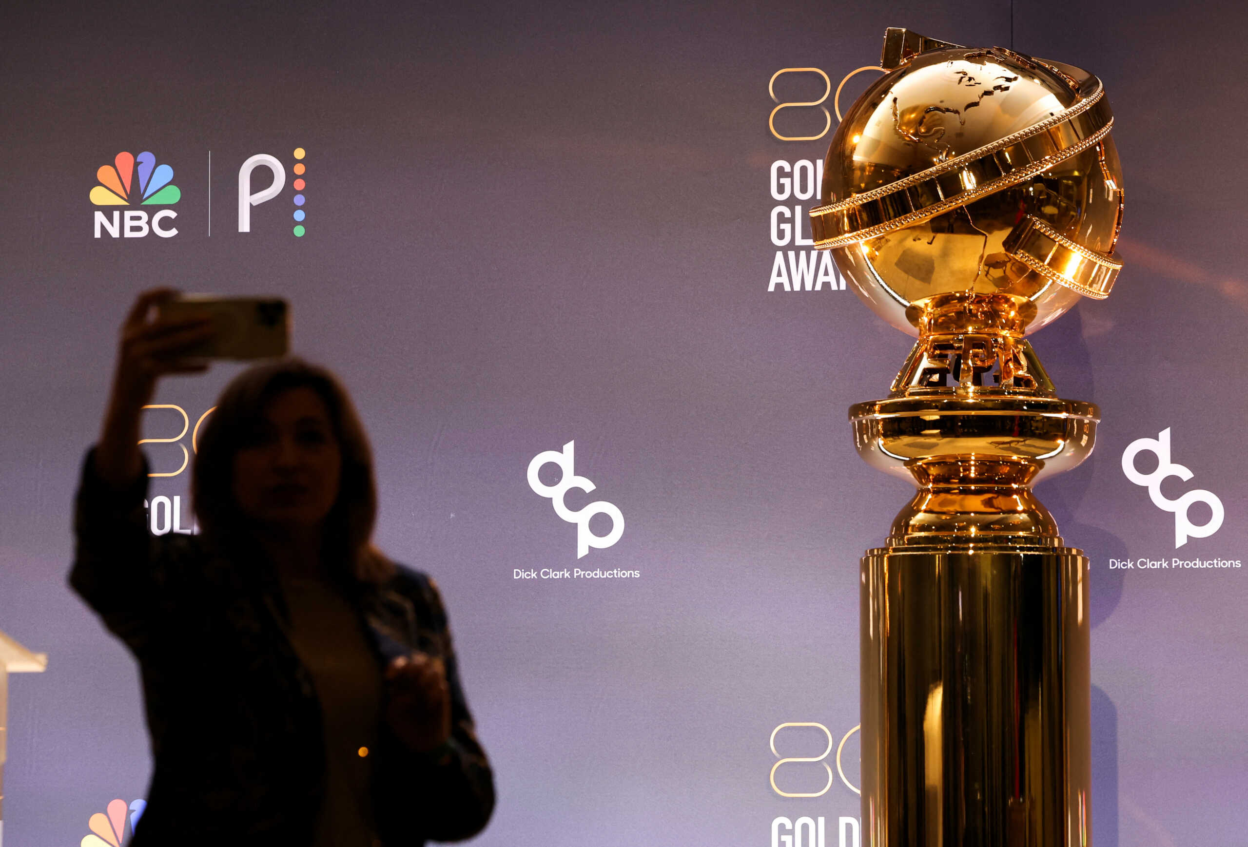 A member of the media works before the 80th Annual Golden Globe Awards Nominations announcement in Beverly Hills, California, U.S. December 12, 2022. REUTERS