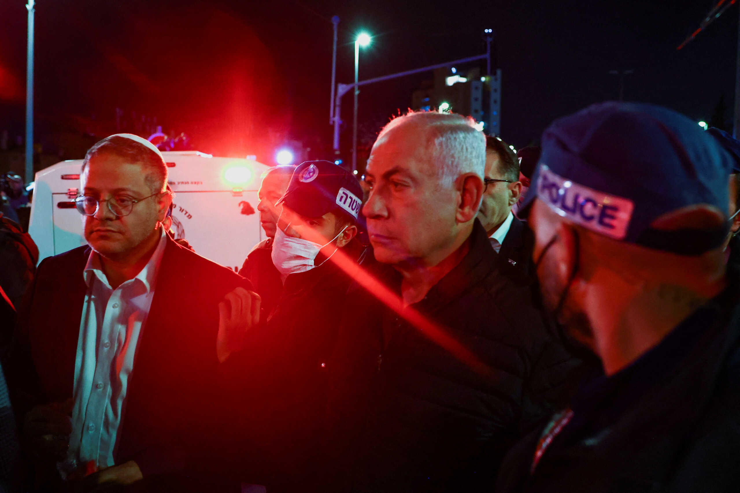 Israeli Prime Minister Benjamin Netanyahu and Israel's Minister of National Security Itamar Ben-Gvir visit the scene of a shooting attack in Neve Yaacov which lies on occupied land that Israel annexed to Jerusalem after the 1967 Middle East war January 27, 2023. REUTERS